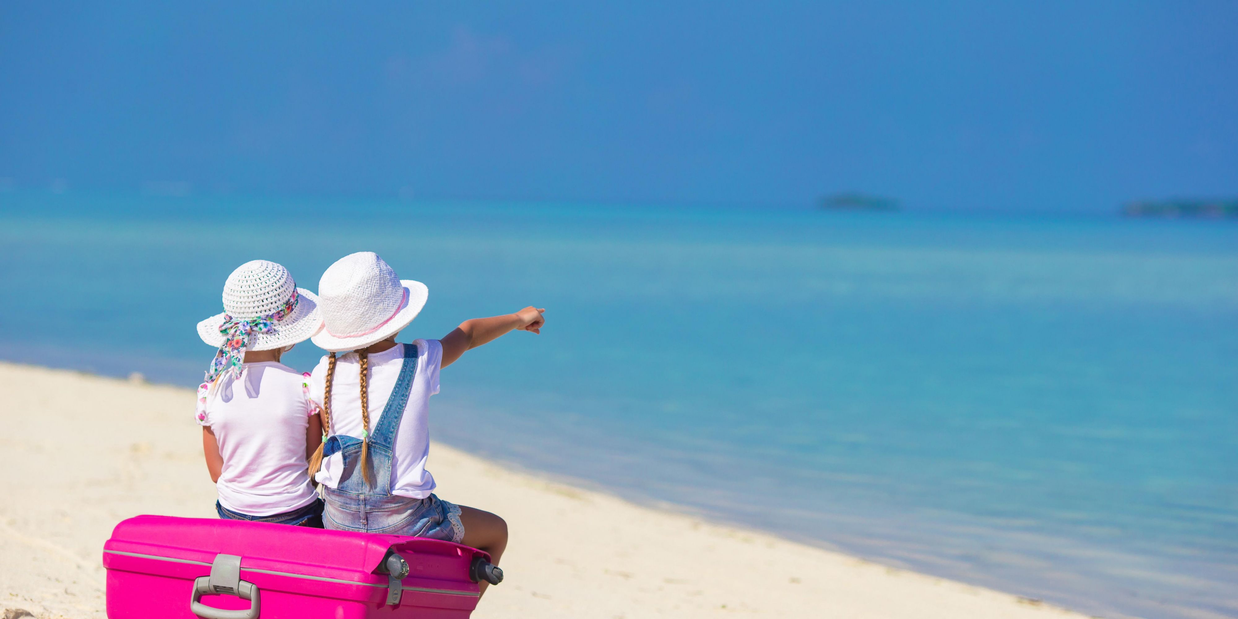 Children looking at Grace Bay Beach