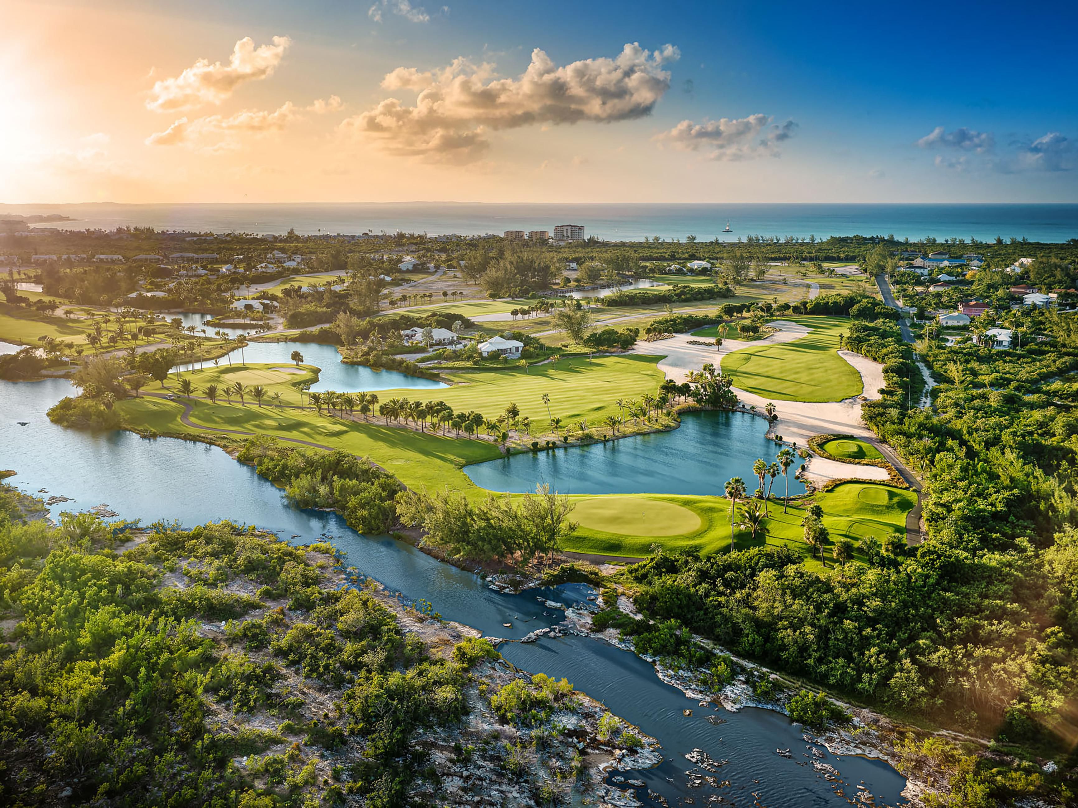 Royal Turks & Caicos Golf Club offers an exceptional 18-hole championship course set among lush tropical landscaping and serene lakes. Known for its beautifully maintained greens and welcoming atmosphere, the club features a full practice facility, pro shop, and a relaxed clubhouse restaurant. Perfect for both seasoned golfers and casual players.