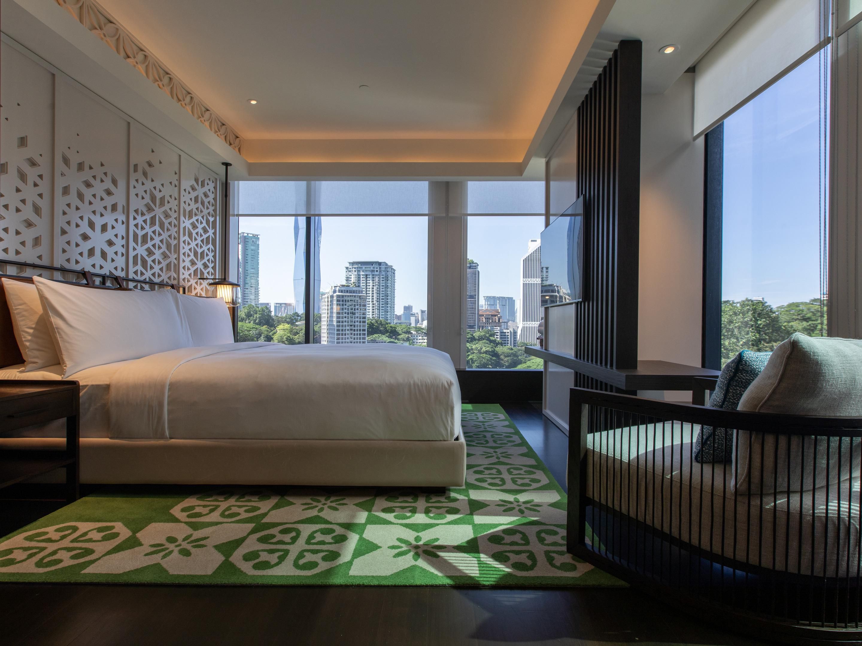 Wake up to stunning KL Tower views. Our rooms blend local charm and modern comfort, with floor-to-ceiling windows and thoughtful design touches. From sunrise to starlight, every glance outside is a postcard-perfect moment at Hotel Indigo Kuala Lumpur on the Park.