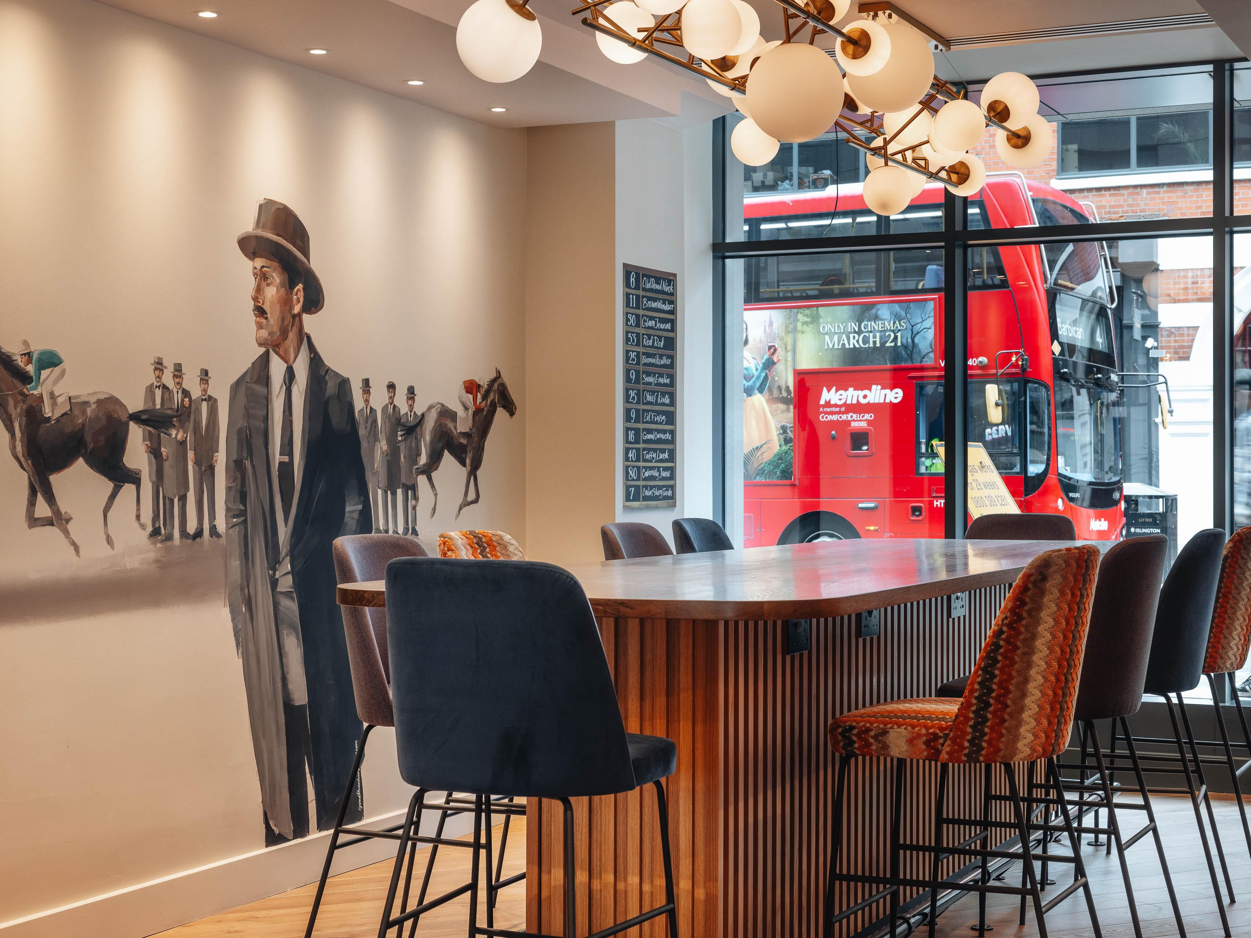 Coworking, made easy. Grab a coffee or pastry and settle in - our high table and lobby booths all have electric sockets, comfy chairs and fast Wi-Fi throughout. Whether it’s a quick meeting or a full workday, you’ll find space to focus. Need to print? Just check with reception.