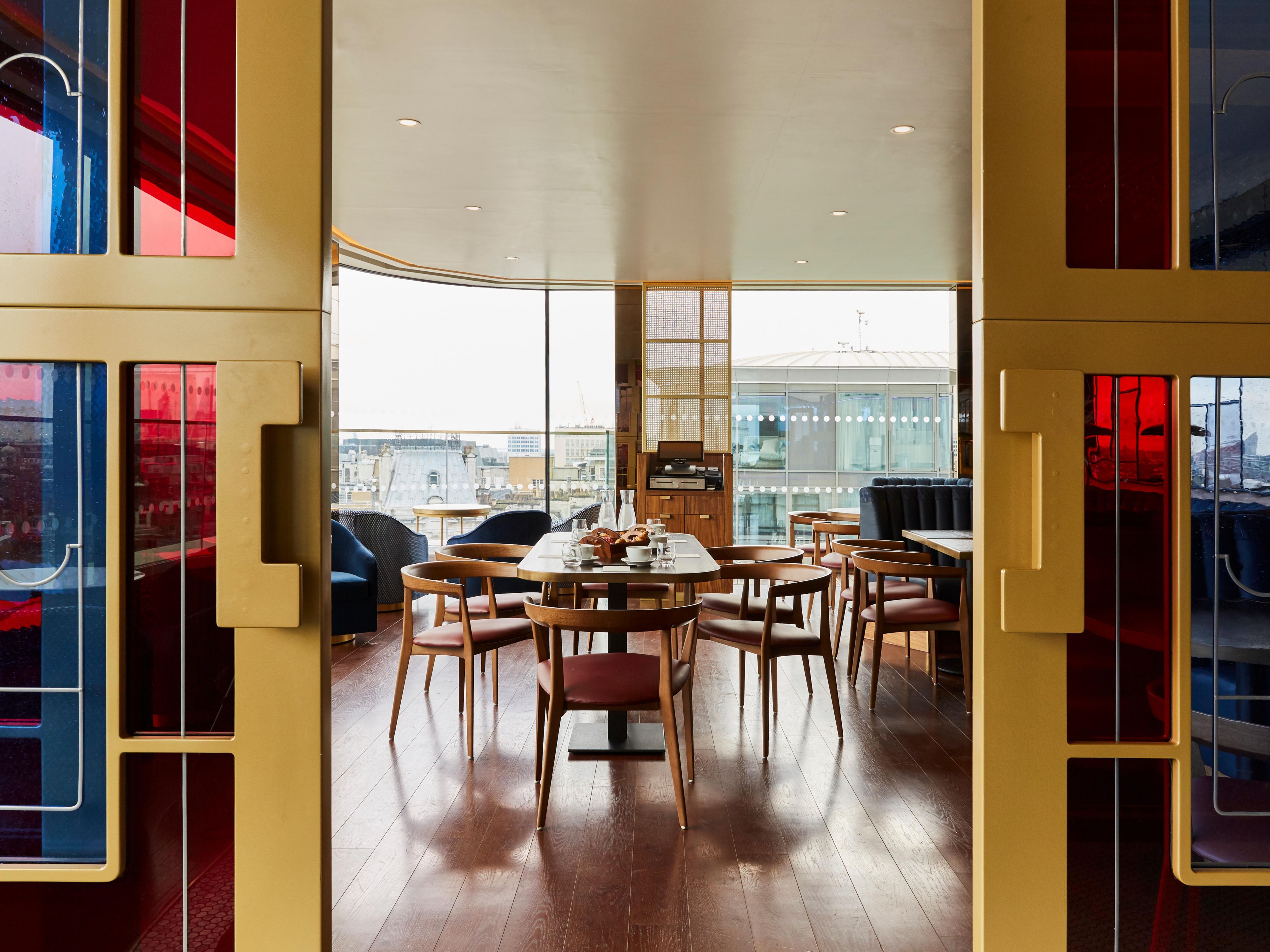 A private rooftop meeting room that is fully serviced and available for functions and meetings, accompanied by the stunning setting of London's iconic skyline.