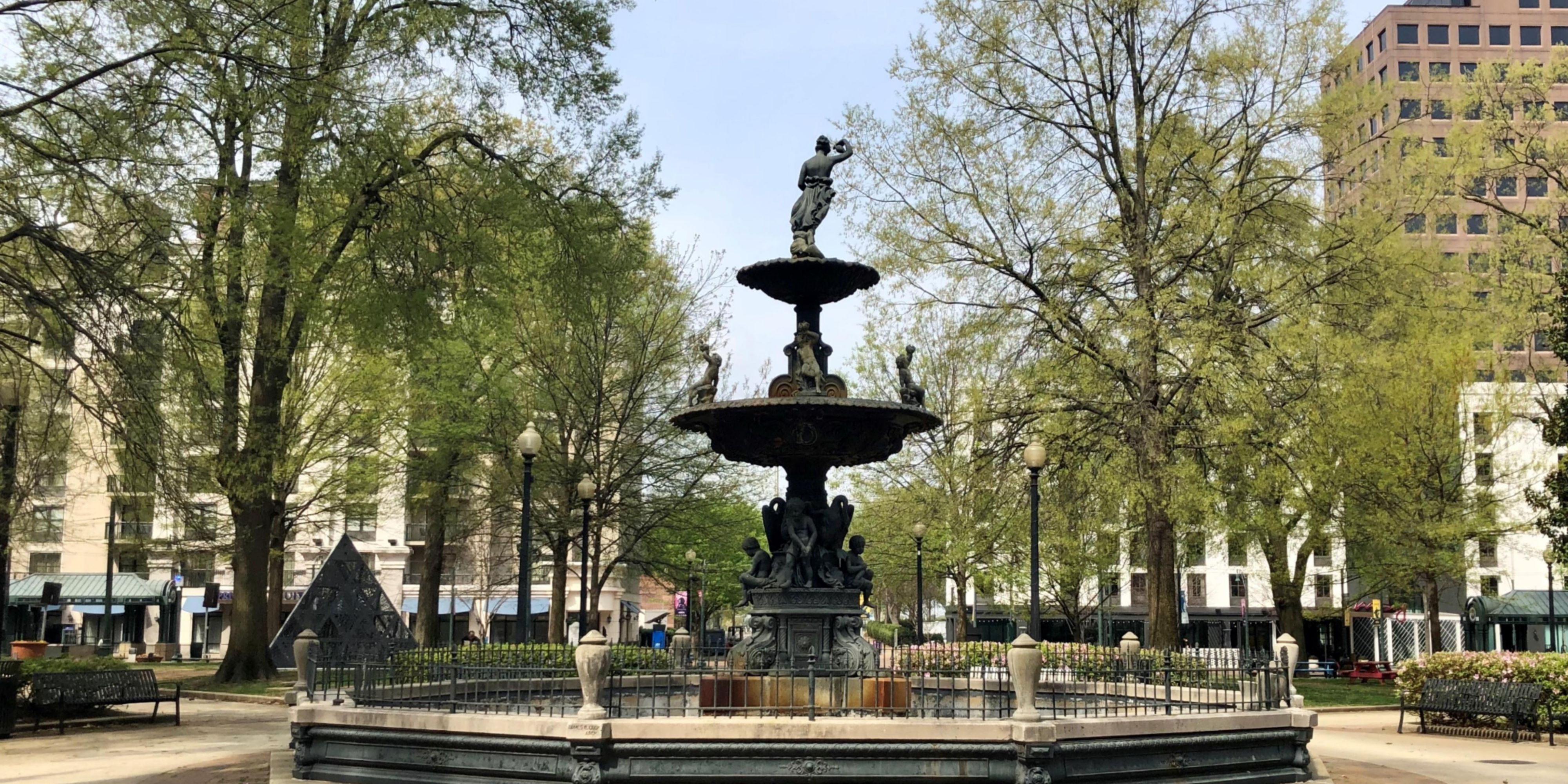 Dogs love the historic Court Square Park - Mask up Memphis