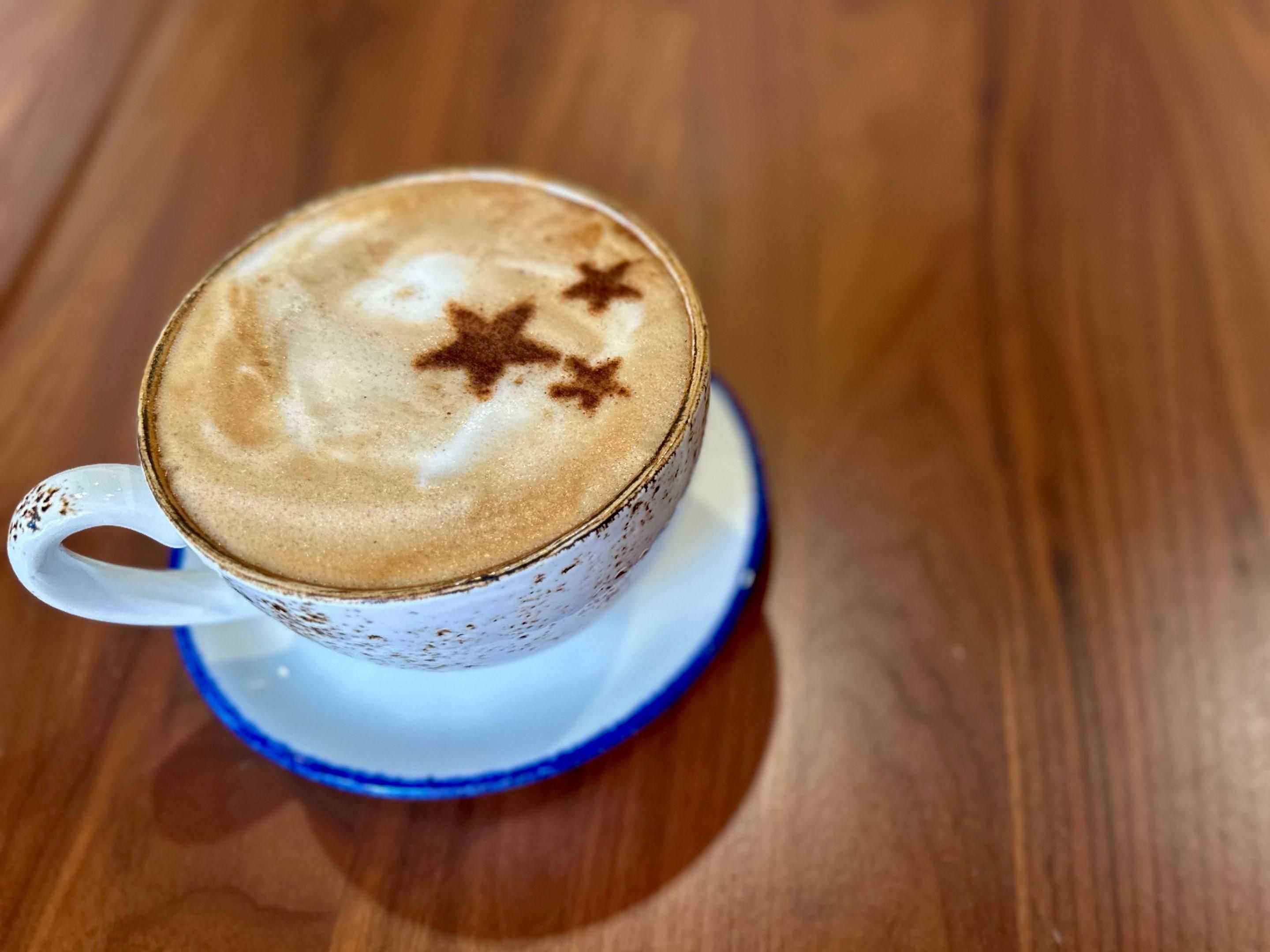 Wake up to the aroma of premium coffee steps from your room. Our onsite Star Bar & Bistro serves expertly brewed espresso, handcrafted lattes, teas, and fresh pastries daily. Whether you're grabbing a quick cup or settling in to savor, our café brings bold flavor and local charm to every sip.