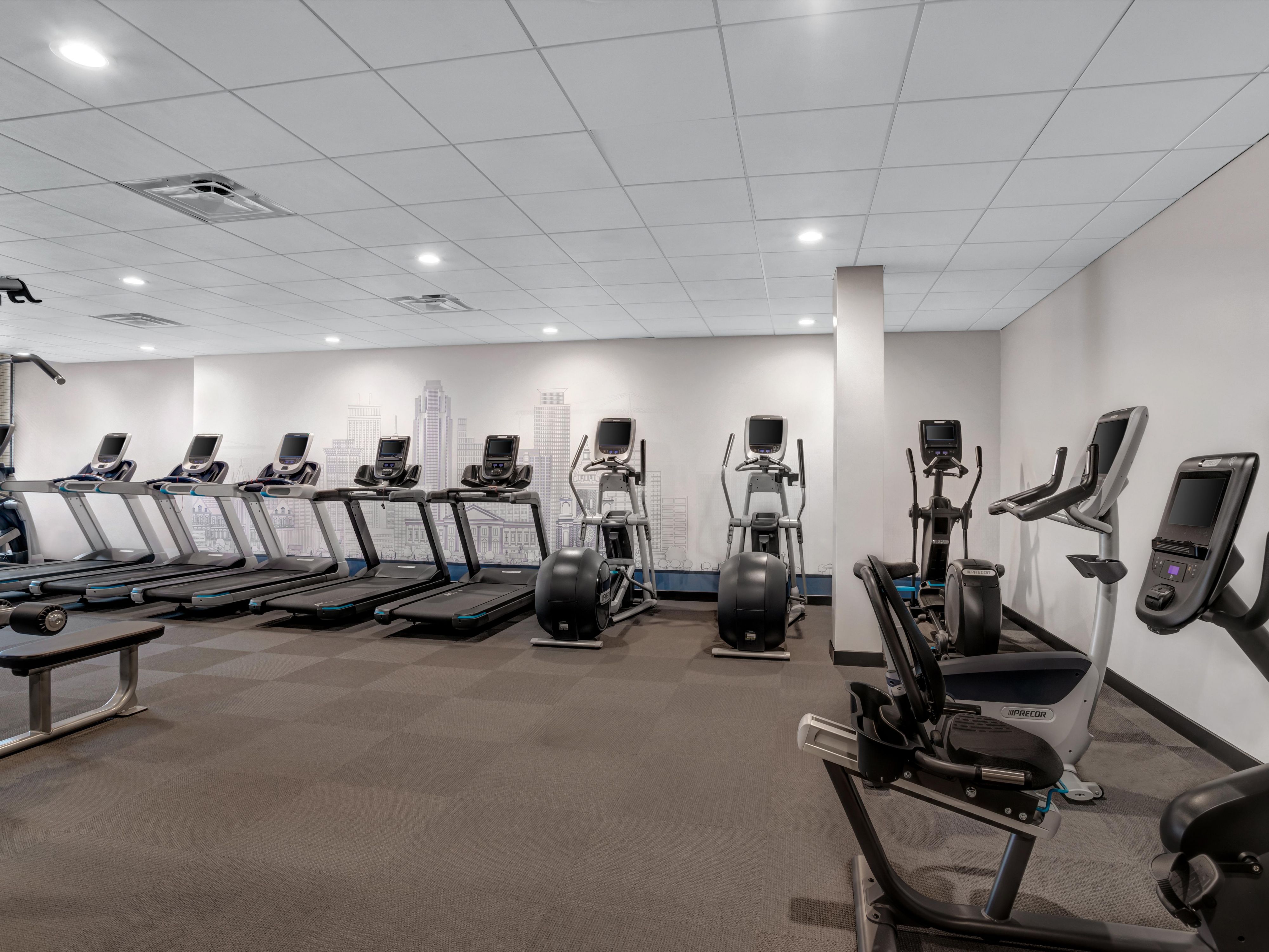 Stay on track with your wellness goals in our 24-hour expansive onsite fitness studio. Featuring top-tier cardio equipment, a Peloton bike, strength machines, free weights, natural light, and plenty of space to move, stretch, and sweat—it's everything you need for a powerful workout, just steps from your room.