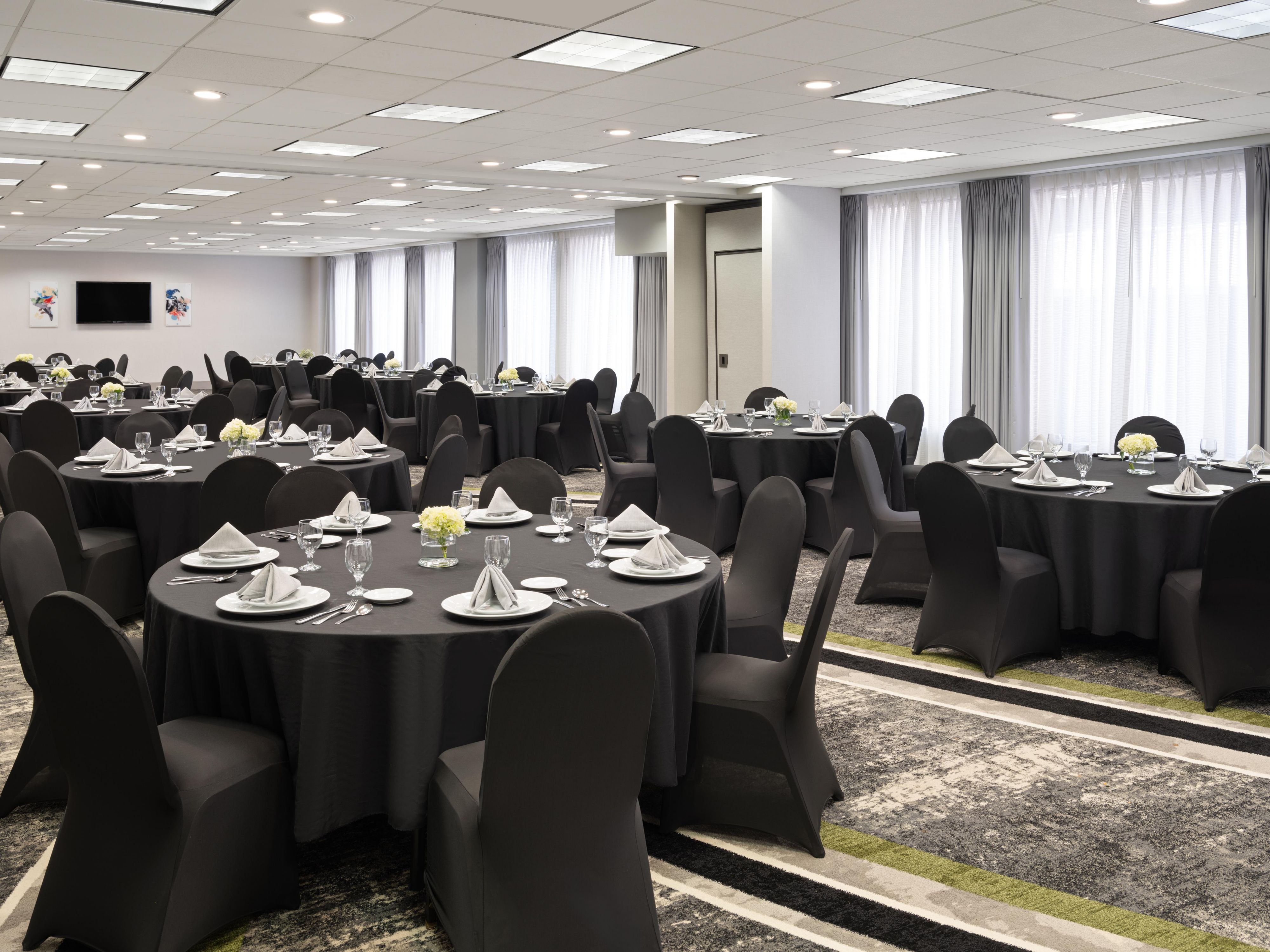 Our hotel offers four flexible meeting spaces, including a multi-purpose room with floor-to-ceiling windows, accommodating events of all sizes from large trainings to private dinners. 