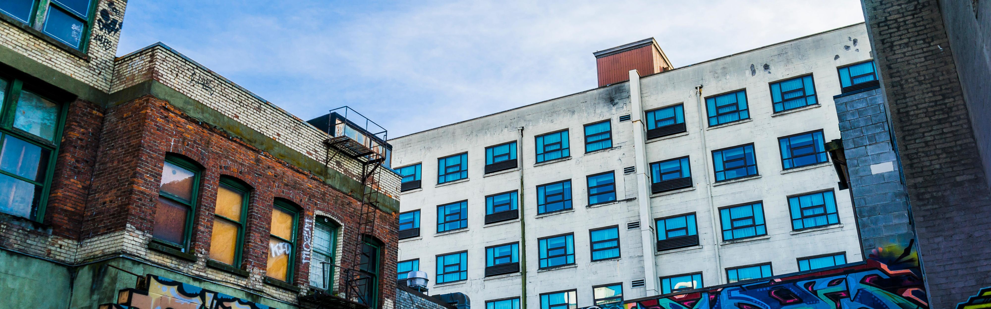 Check out the neighborhood graffiti wall during your free time.