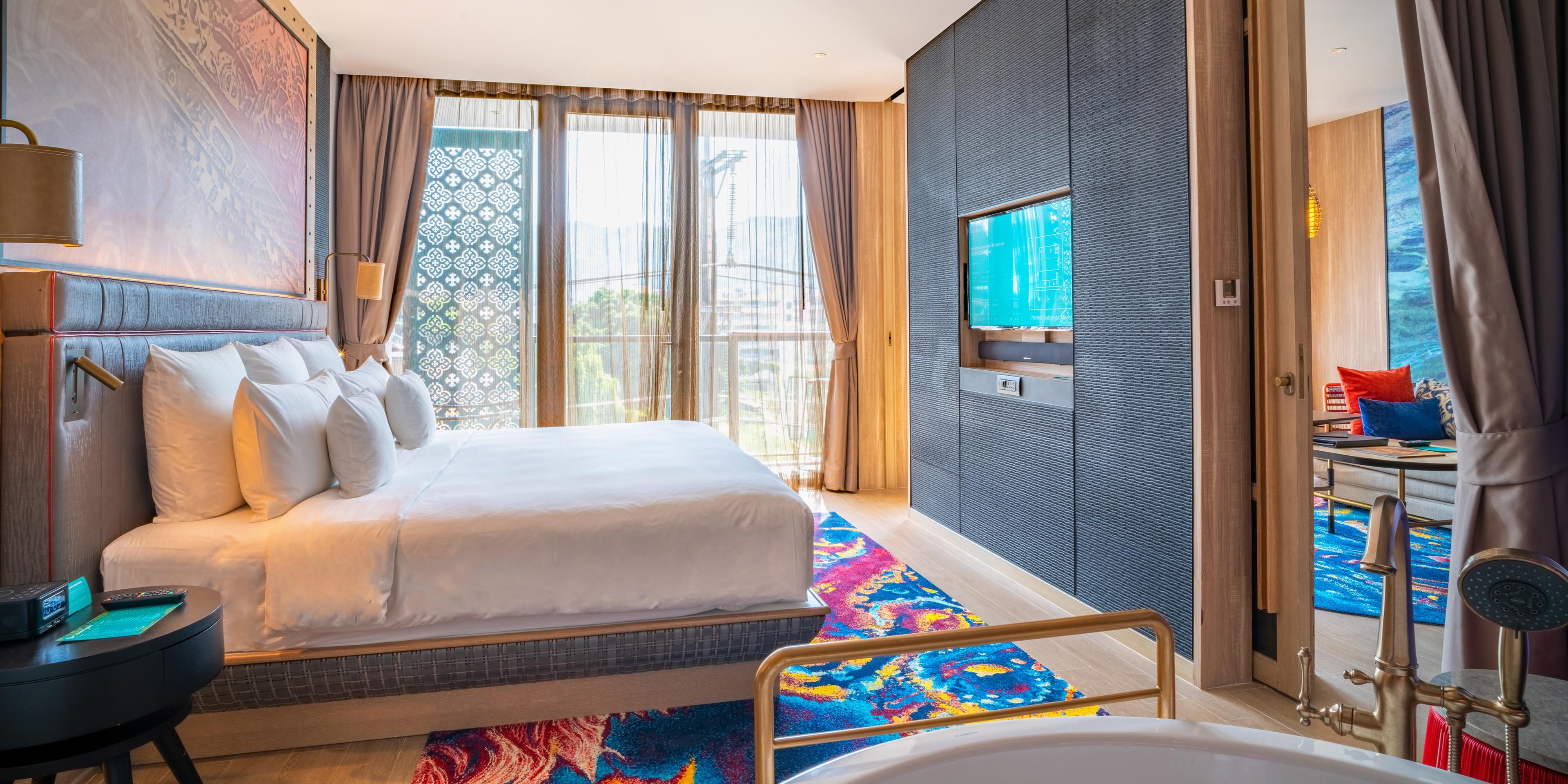 private suite with a king bed and a spacious separate living area.