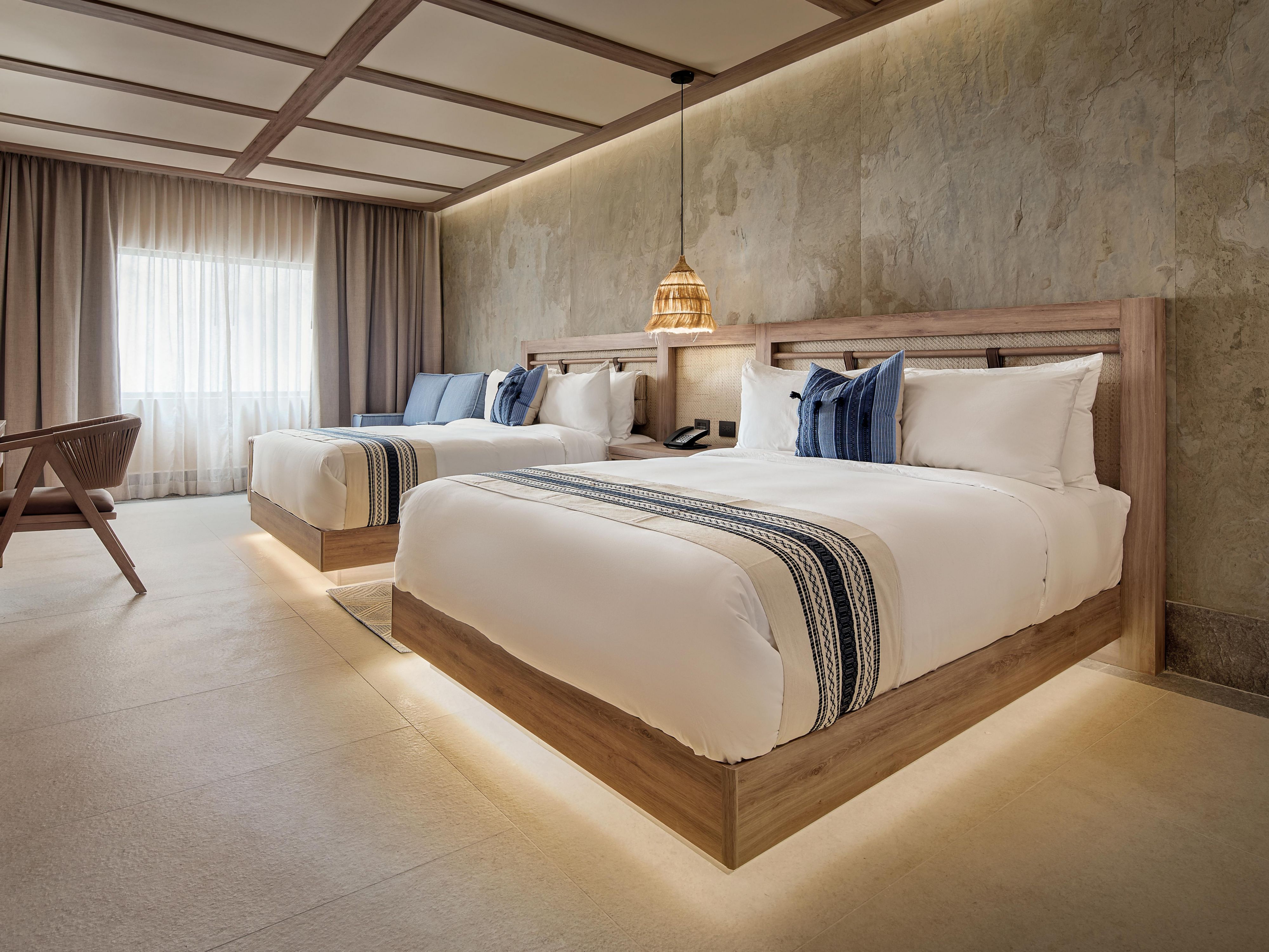 Our pet-friendly rooms welcome furry companions with comfort and care. Select rooms on the lower level feature a private terrace, perfect for outdoor lounging. Each stay includes a cozy pet bed, water bowl, and thoughtful touches to ensure both guests and pets feel right at home.