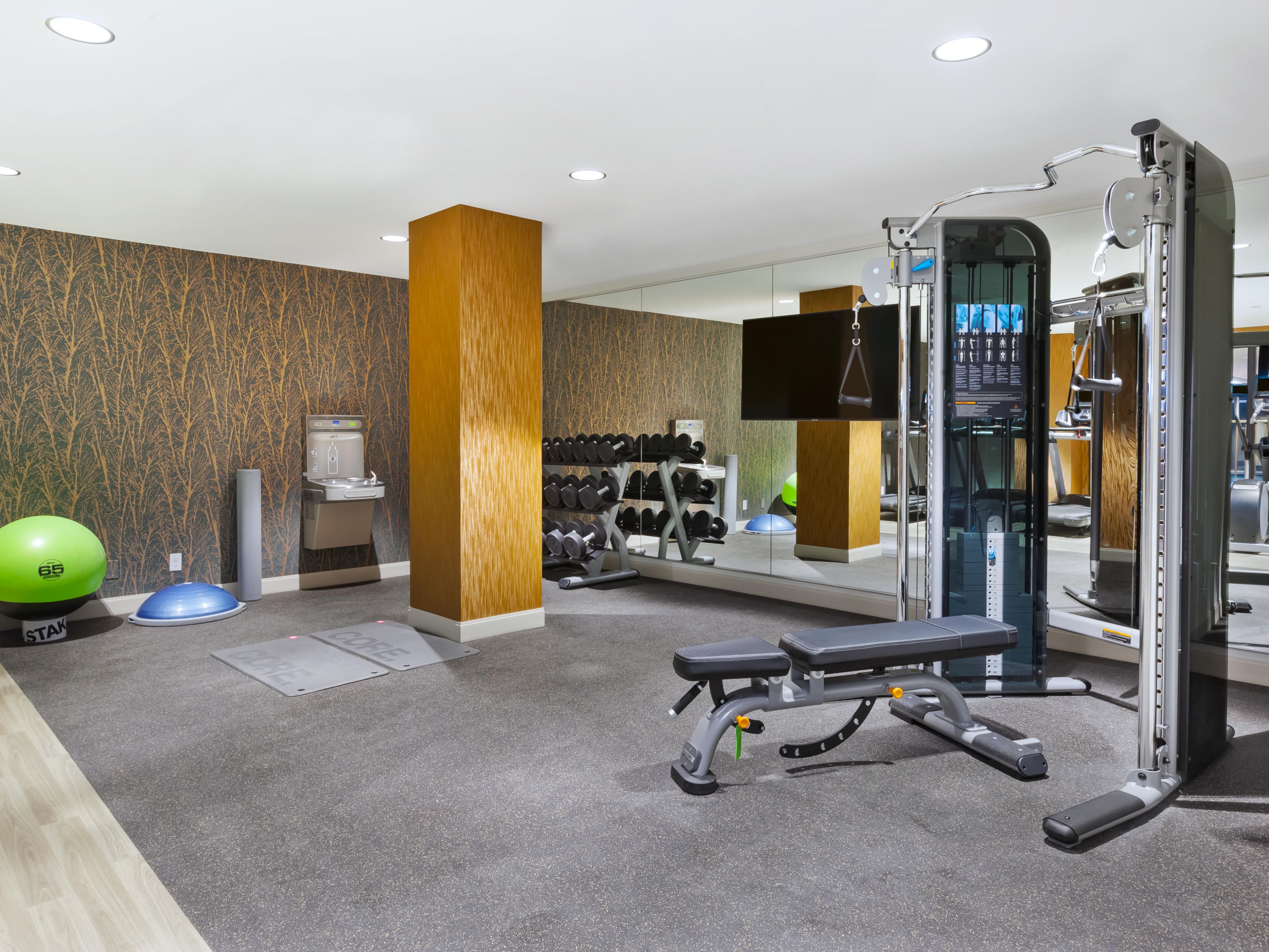 Experience elevated comfort with our upscale amenities which include spacious guest rooms, a state-of-the-art Fitness Center, and Crave Restaurant with patio dining, a cozy bar, and room service. Enjoy a pet-friendly environment, an enhanced gift shop, and exceptional hospitality at every turn. 