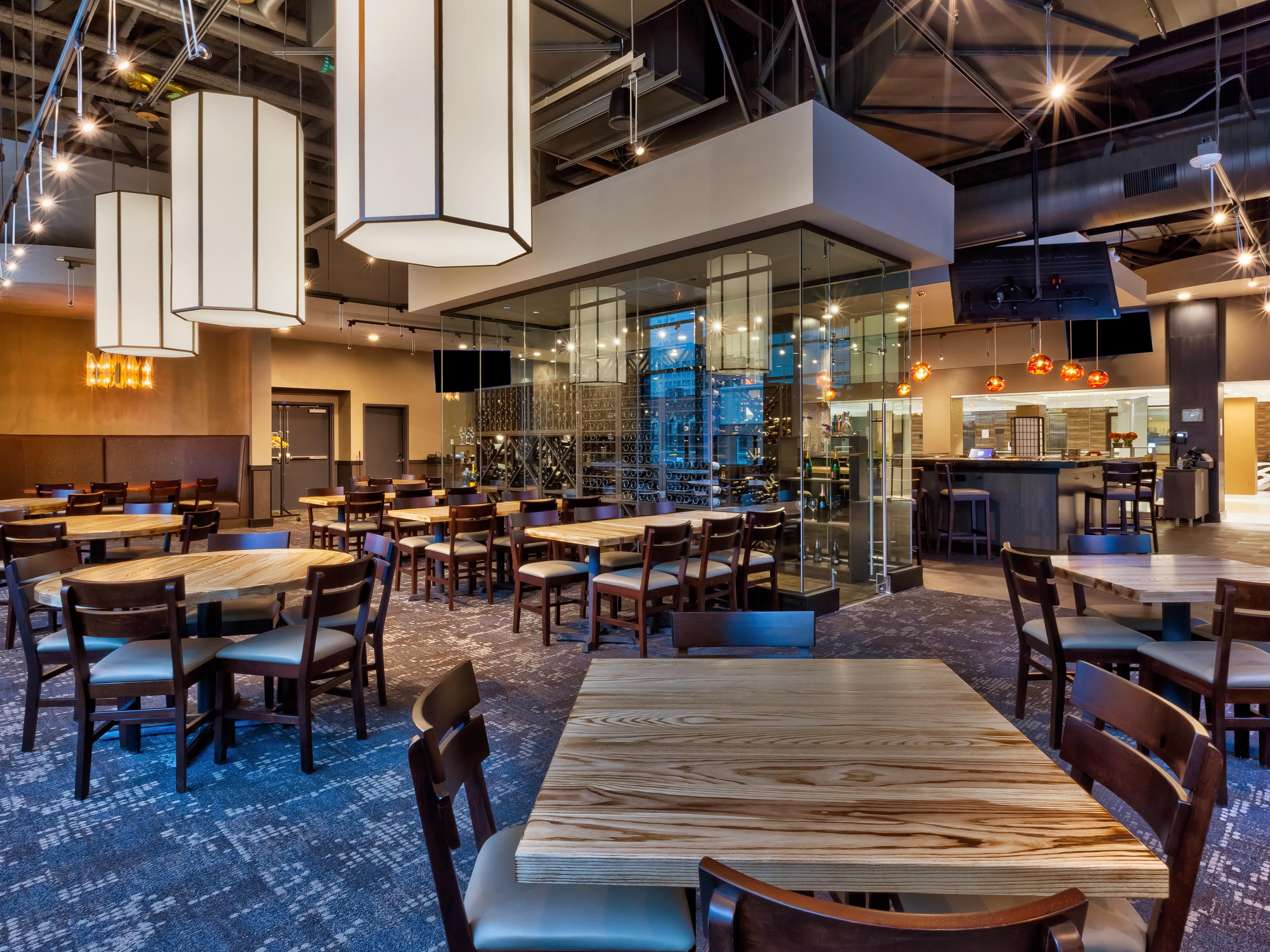 Savor delicious dining at Crave Restaurant located on the 2nd floor. With a retractable roof and walls, Crave creates a unique outdoor vibe with downtown views. Enjoy a full menu featuring American dishes, sushi, gluten-free, and vegan options. Breakfast, lunch, or dinner—it’s a dining delight! 