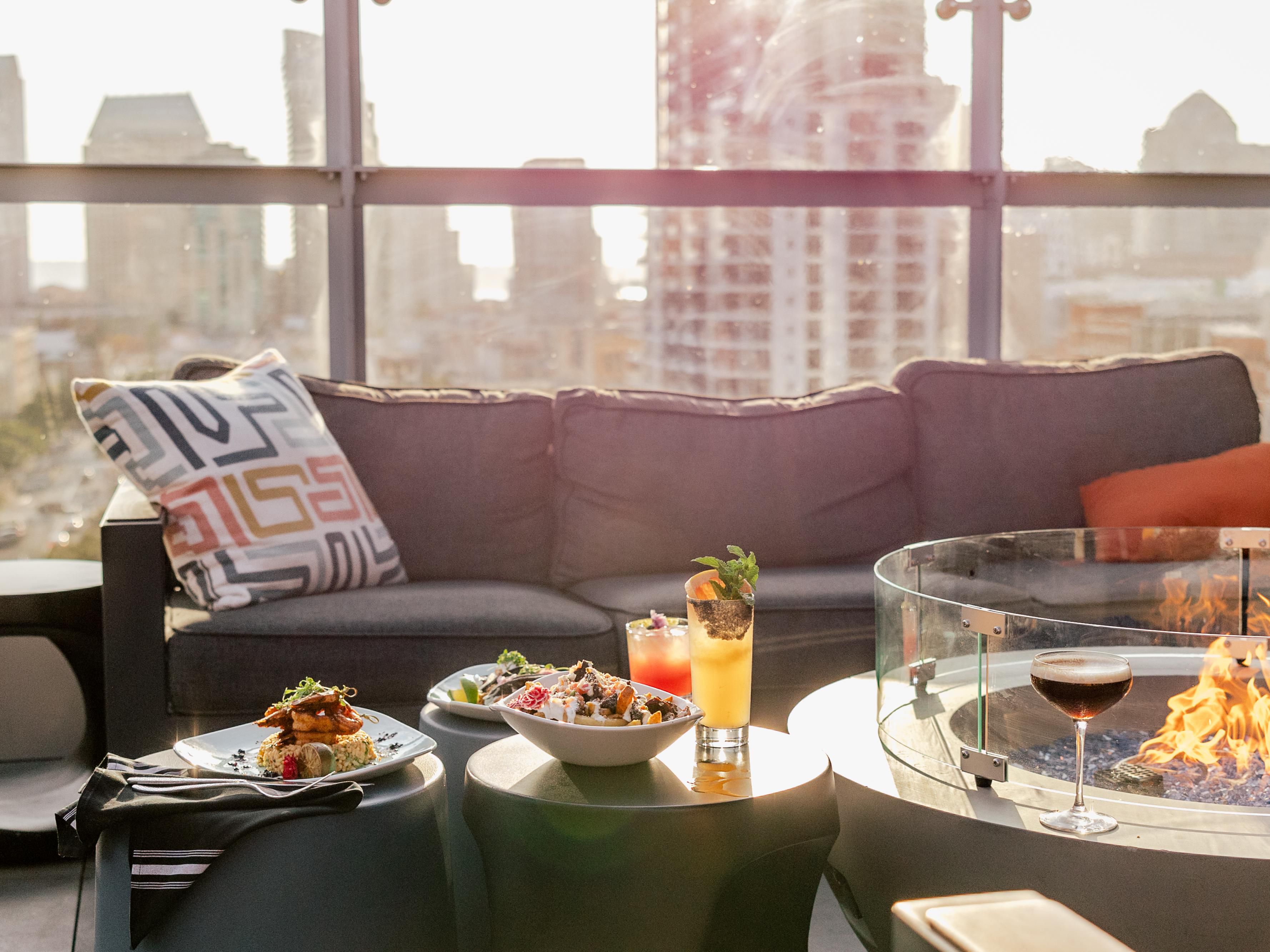 Borrego Rooftop offers a unique dining experience for visitors and locals alike with stunning views of San Diego's skyline and vibrant Gaslamp Quarter. Enjoy a menu inspired by local flavors, craft cocktails, and a lively atmosphere perfect for socializing. Enhance your San Diego experience with a visit to our rooftop retreat.