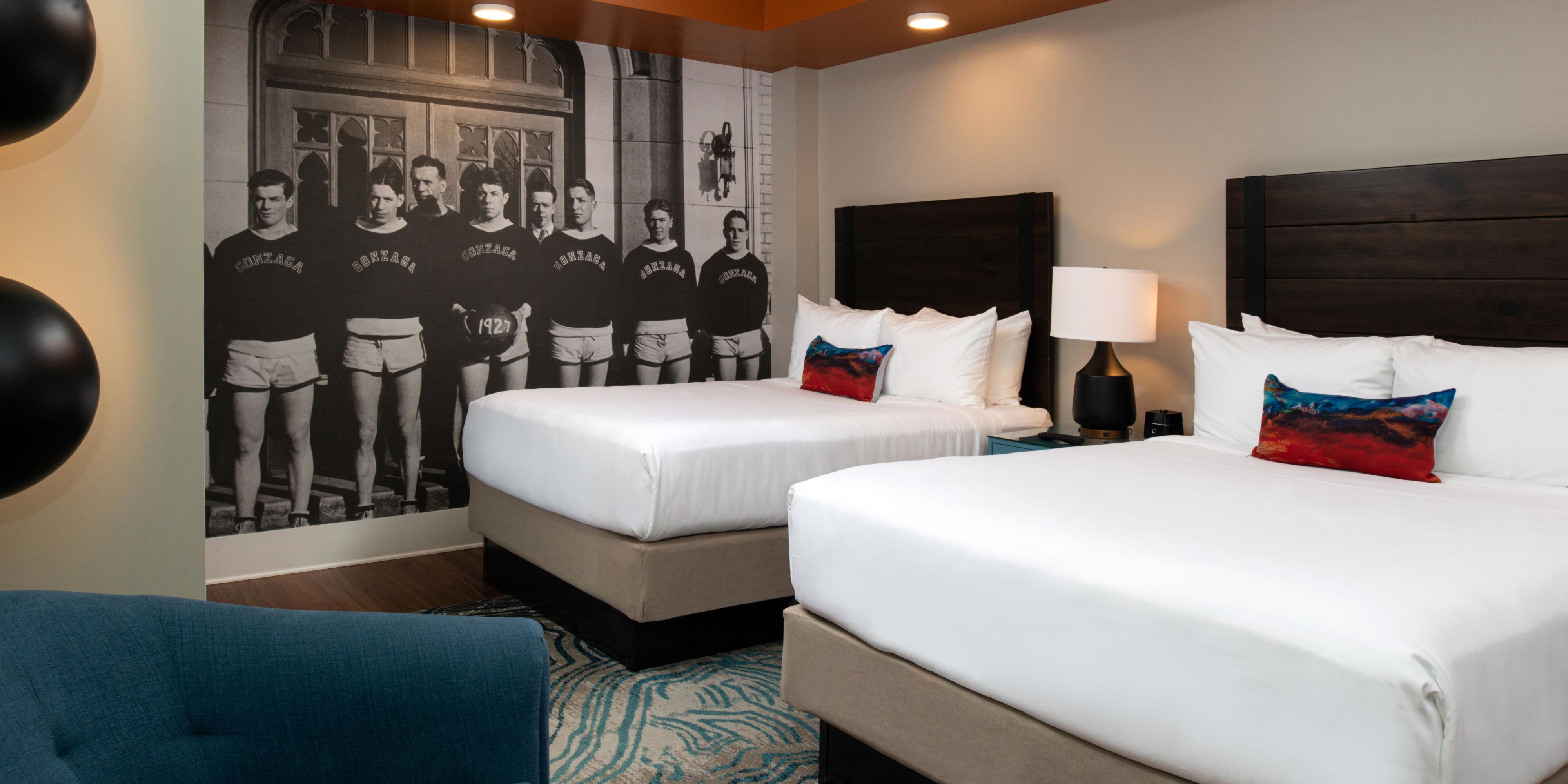 Chic double-bed room with a historical backdrop.