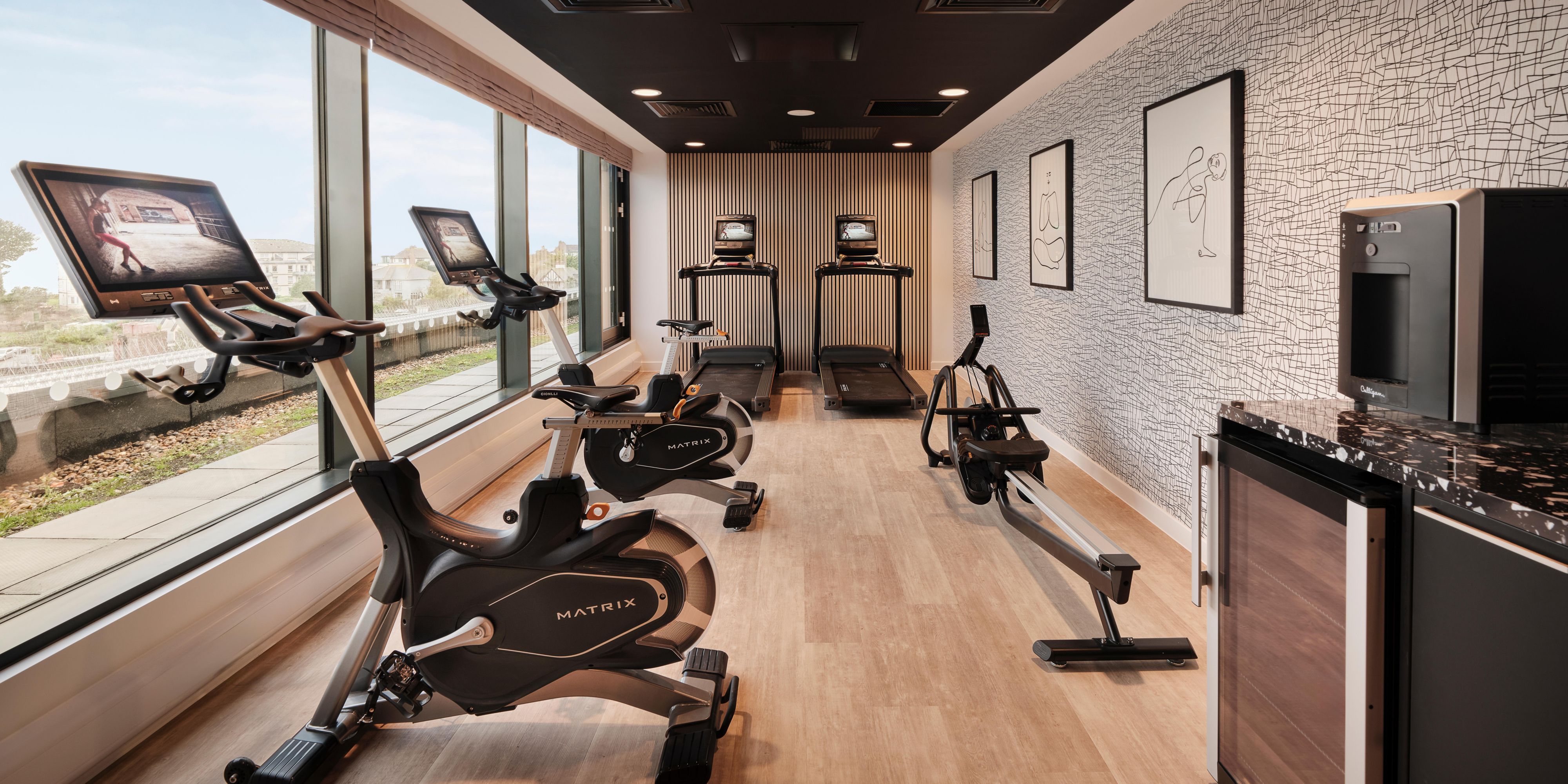 Work out in a modern gym with stunning sea views.