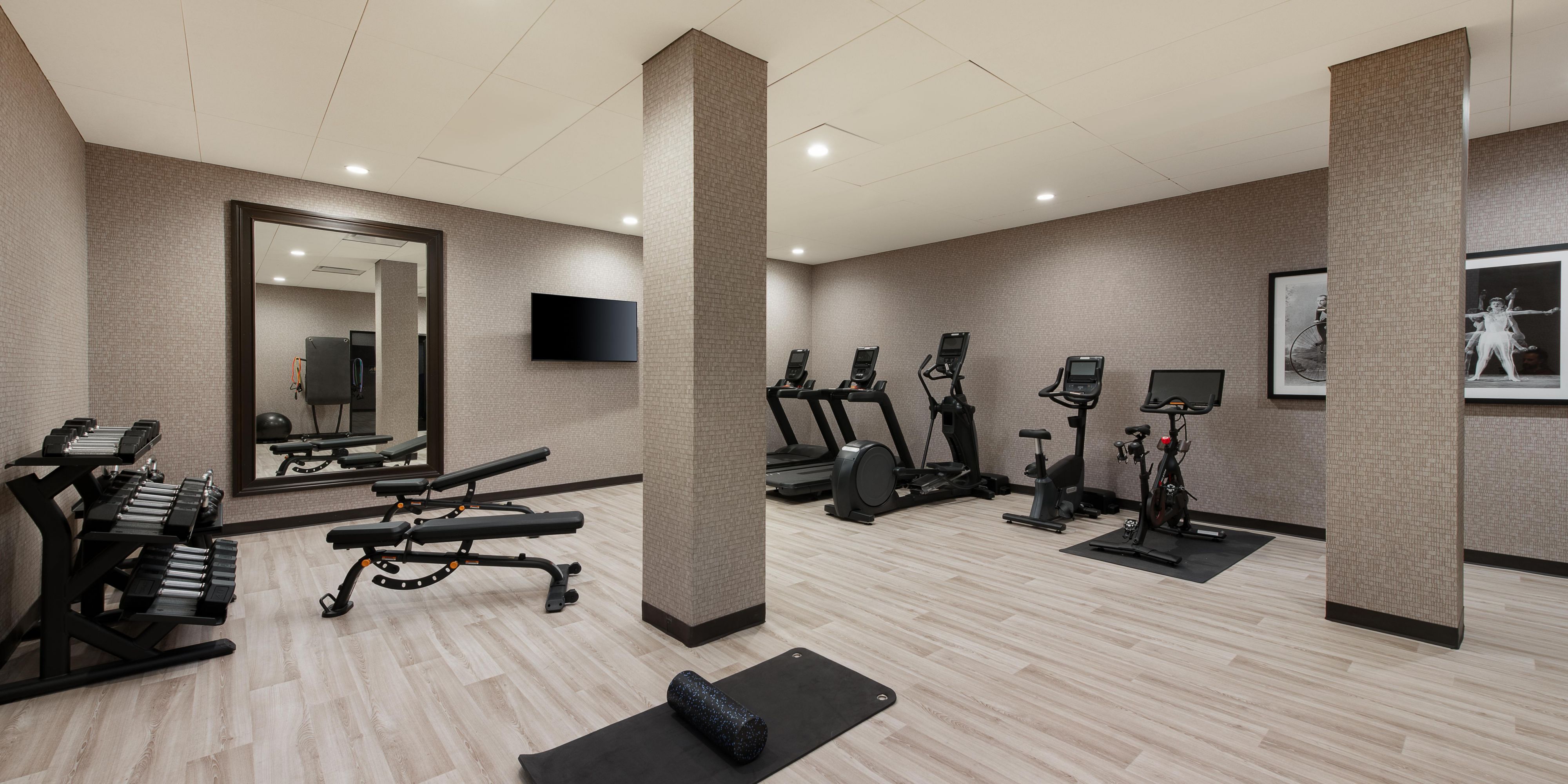 Our fitness room has free weights, treadmills, and a  Peloton bike