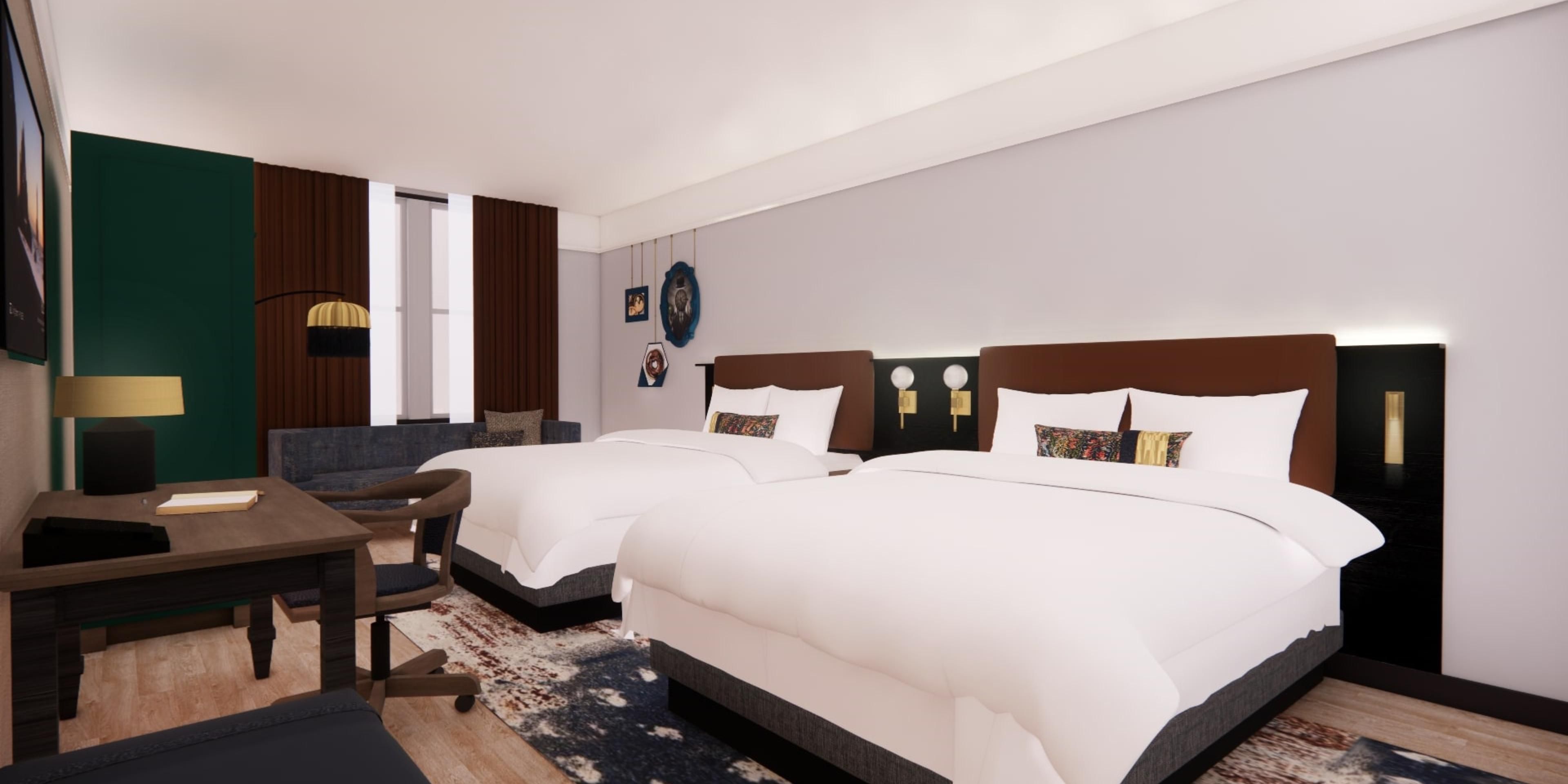 Choose from one king or two queen beds with plush bedding.