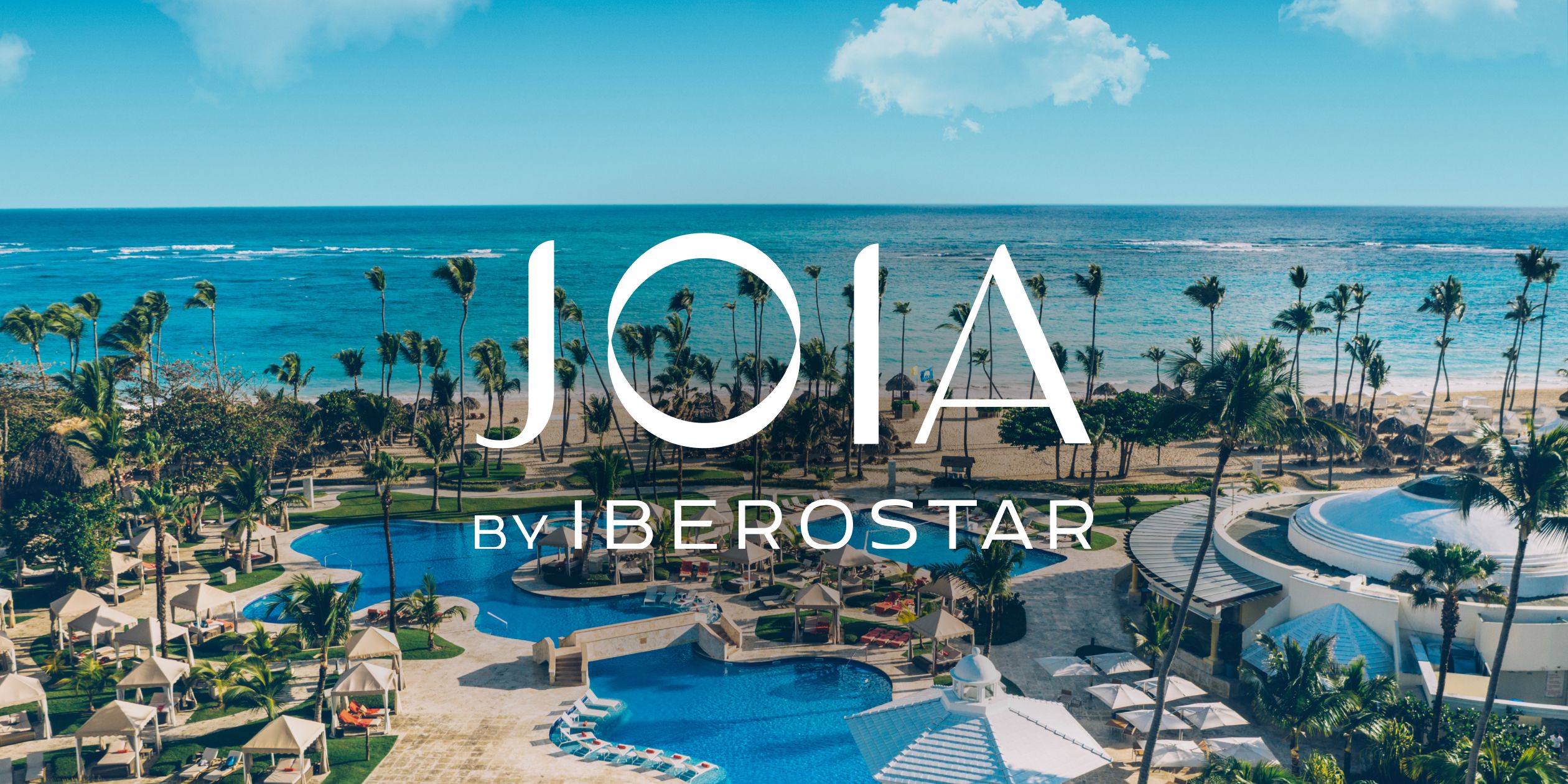 JOIA by Iberostar 度假村的泳池与海滩美景。