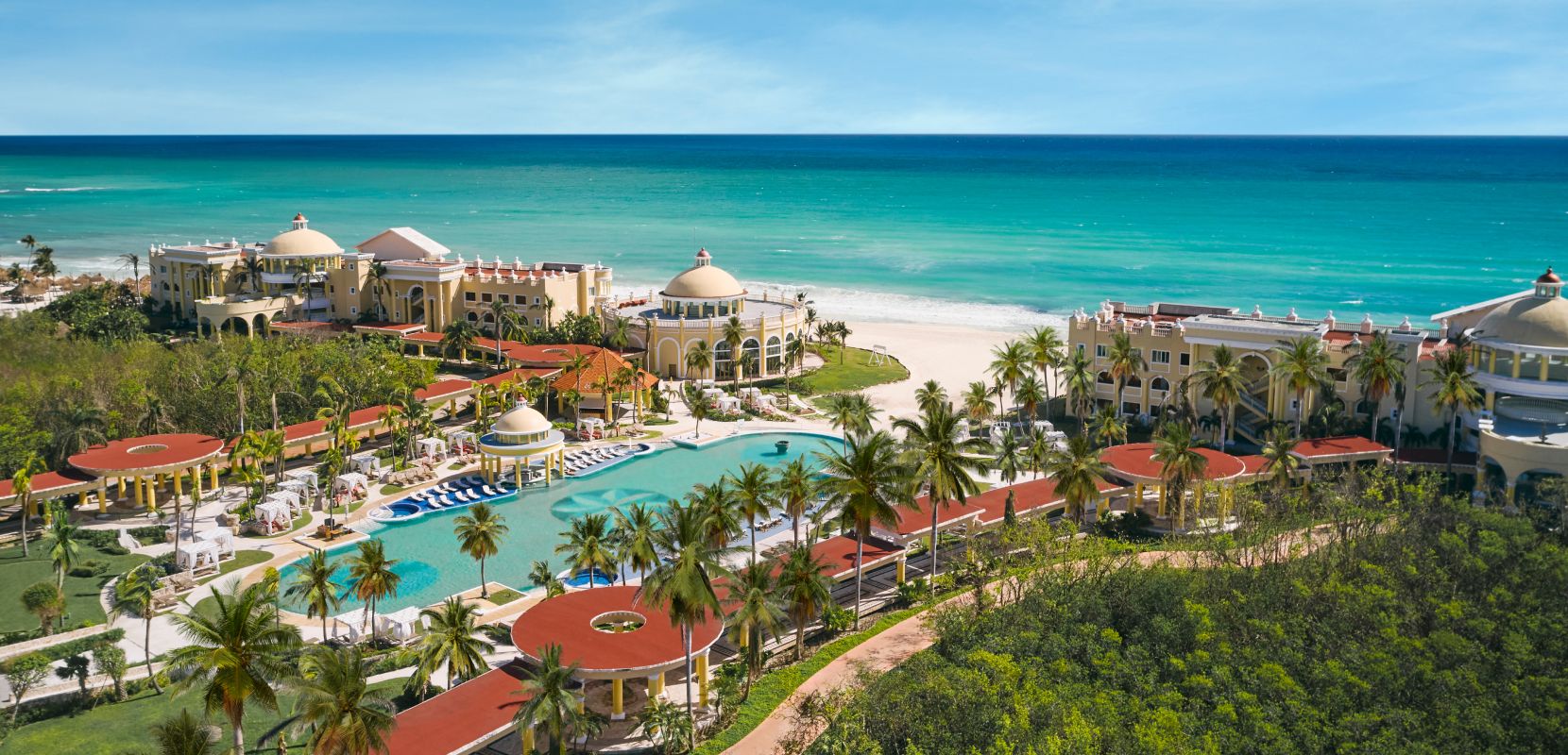 A stunning resort rising majestically over the ocean in Riviera Maya.