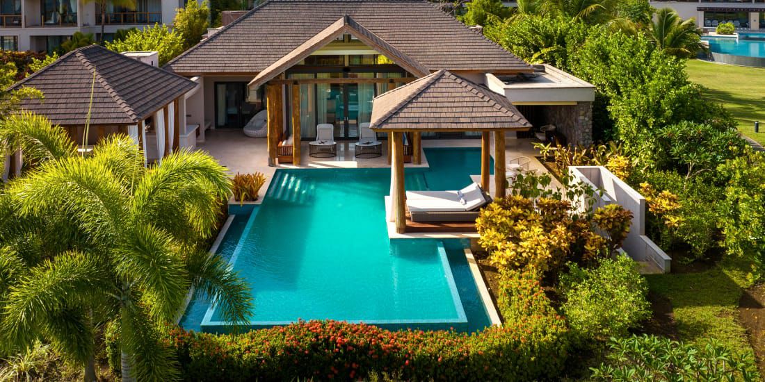 suite with a private pool in lush tropical setting