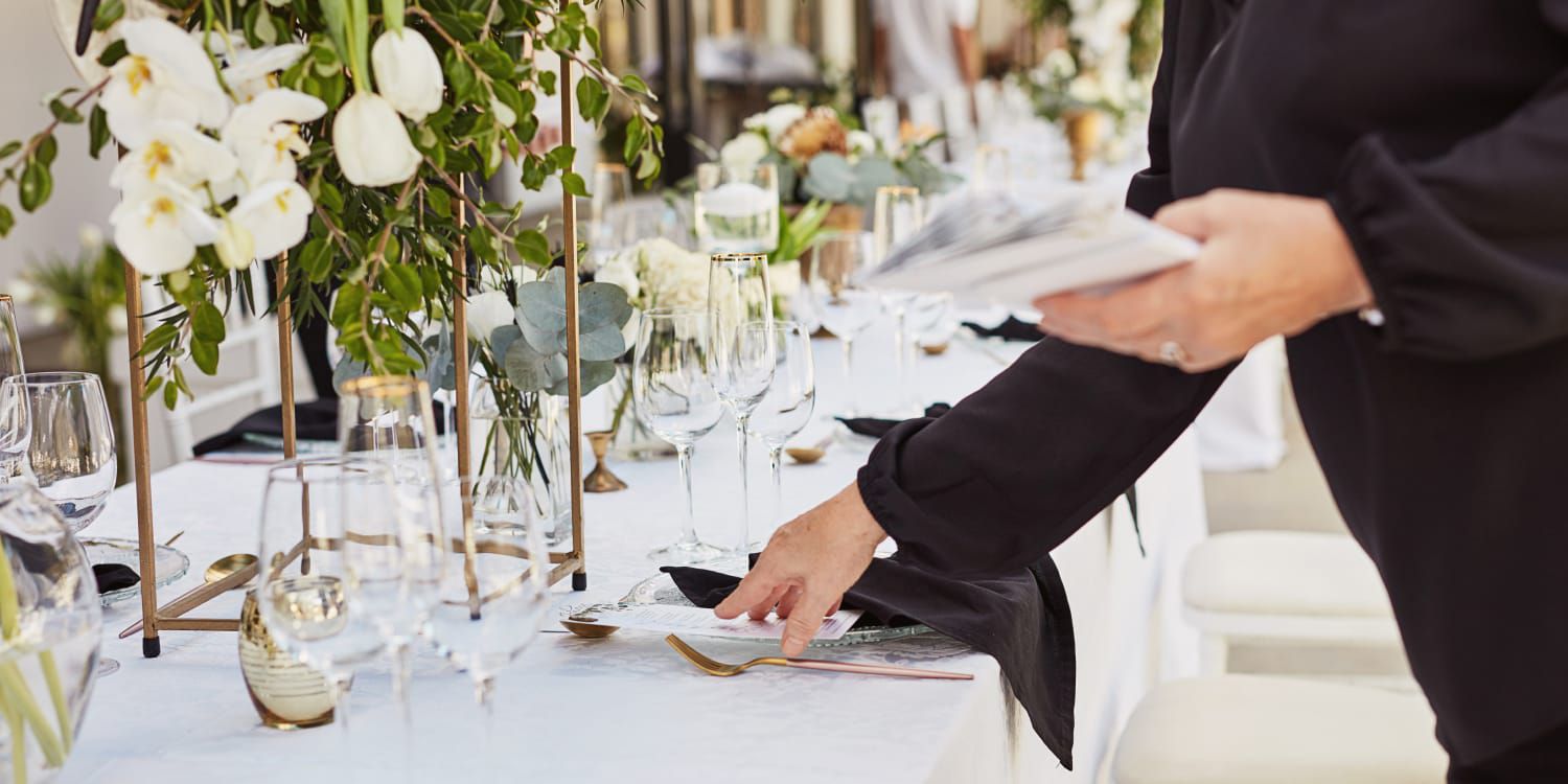 setting the finishing touches on a beautiful table setting