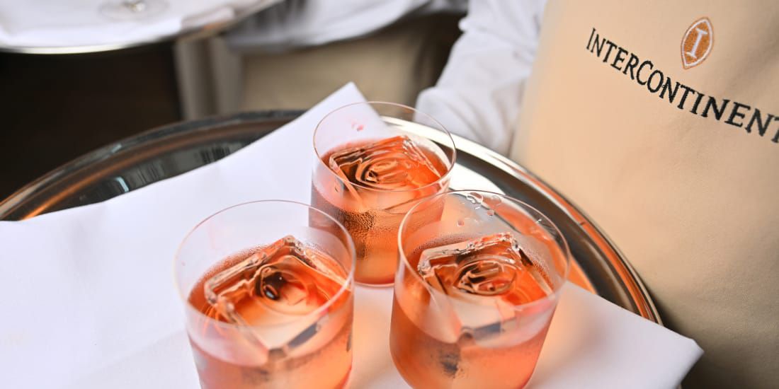 Welcome cocktails served with king cubes of ice monogrammed with the InterContinental seal.
