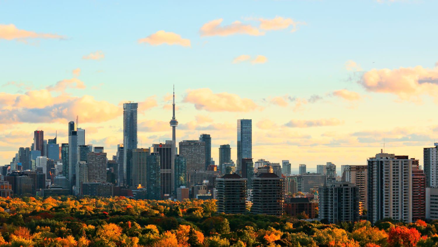A vibrant sunset view of the city skyline in one of Canada’s most famous cities.
