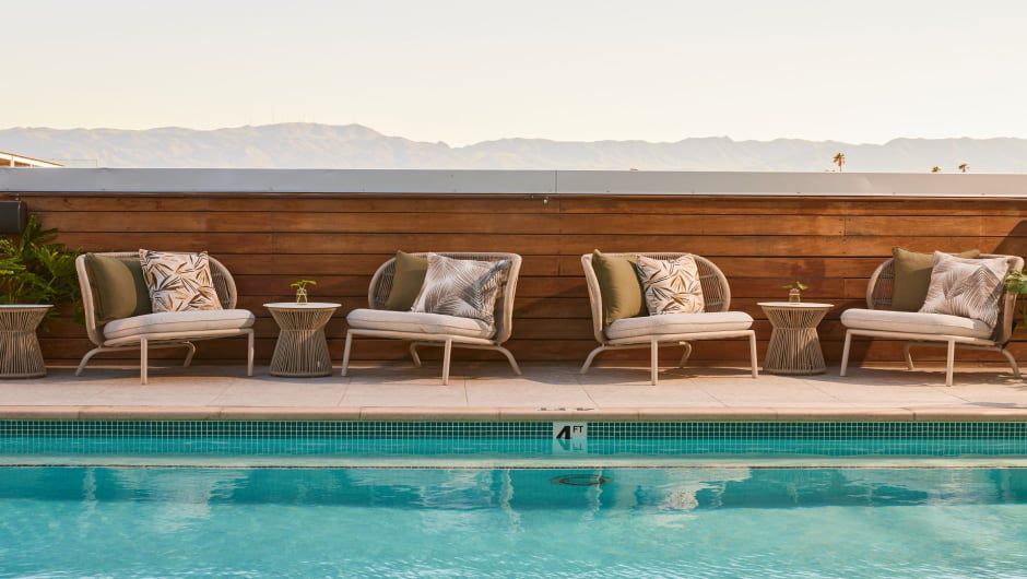 Image of a pool with chairs