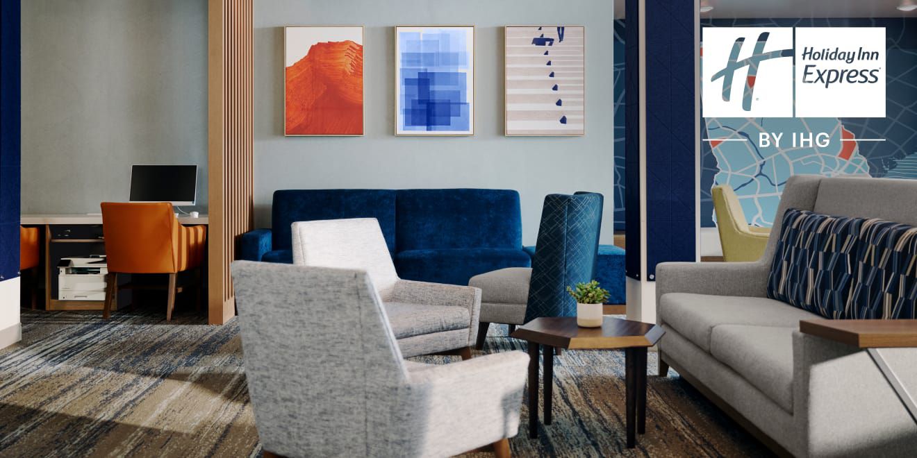A modern seating area with blue and orange accents.
