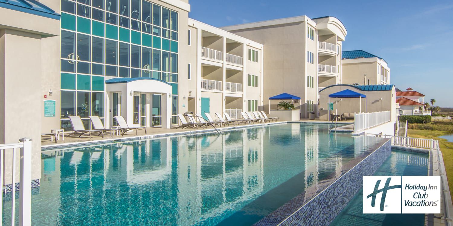 Infinity edge swimming pool outside hotel