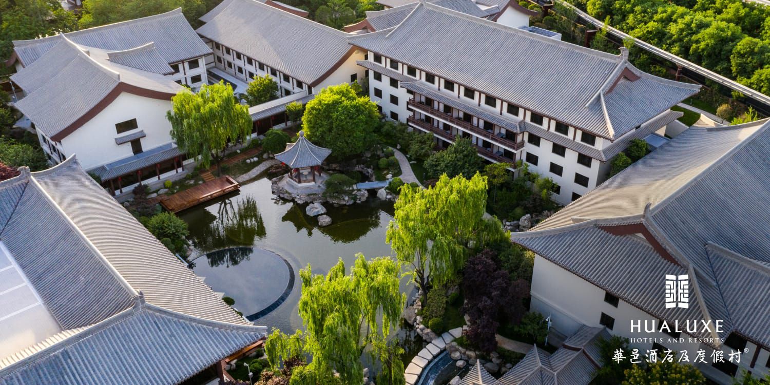Aerial shot of hotel and reflection pond