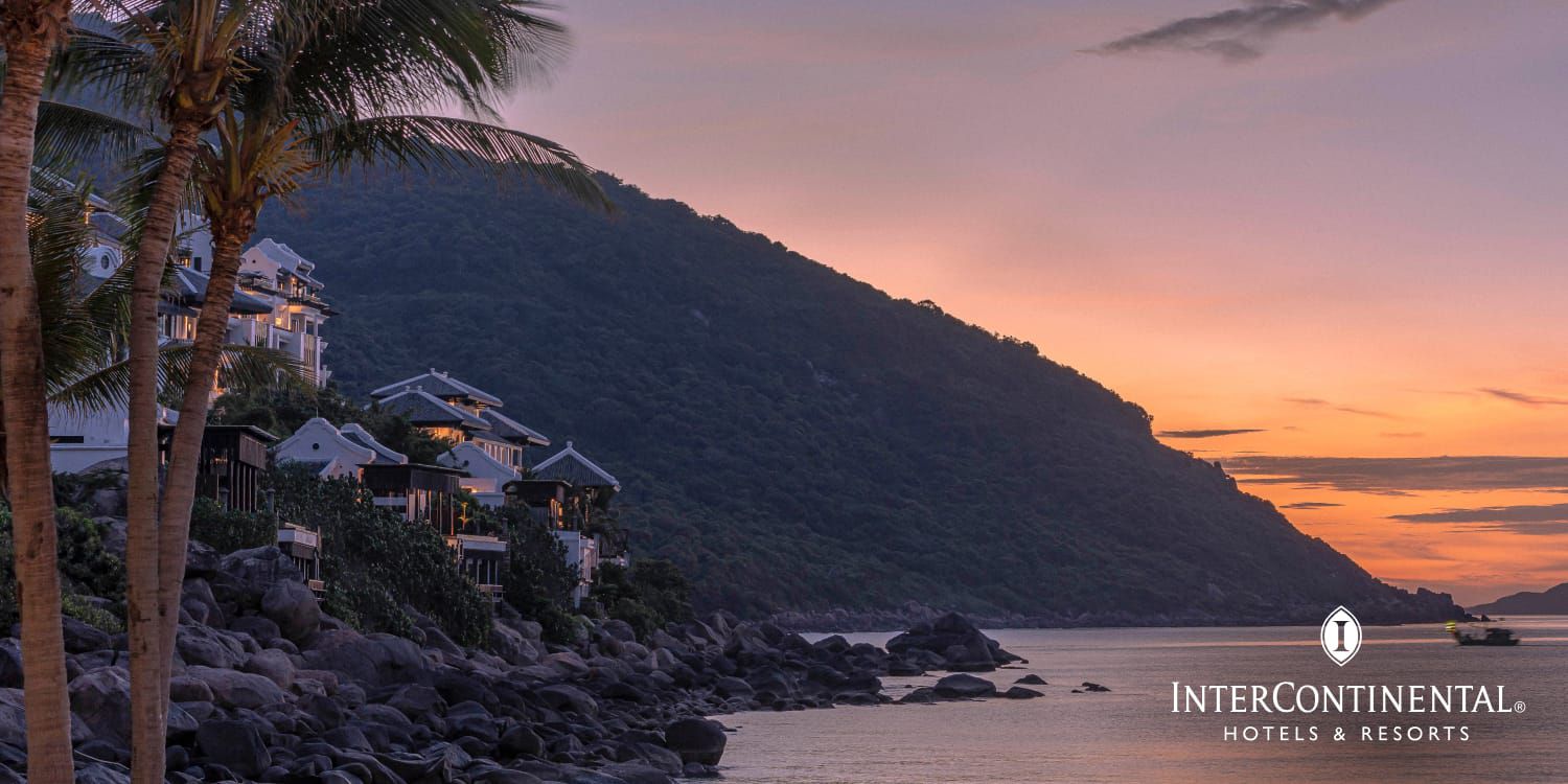 Villas on a mountainside overlooking the ocean
