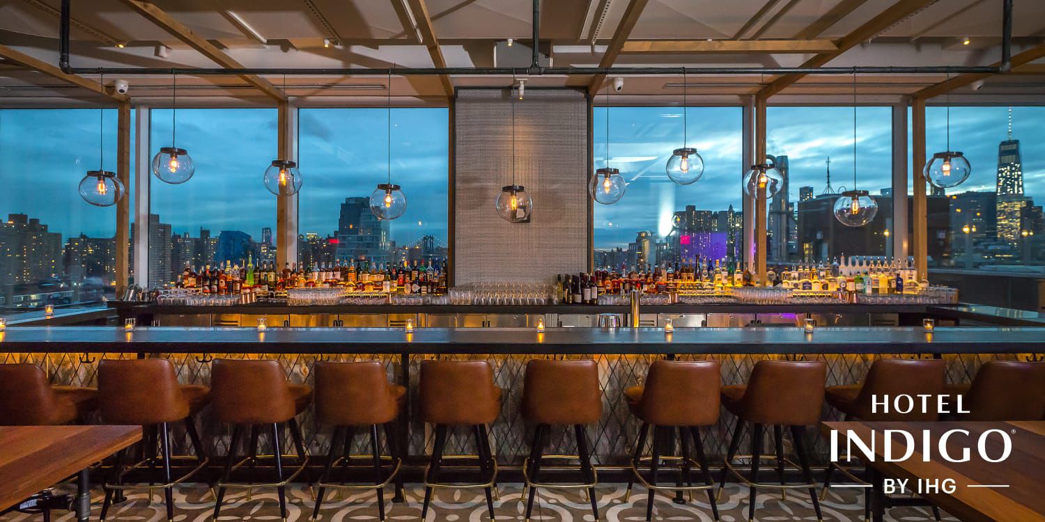 Upscale bar overlooking city skyline