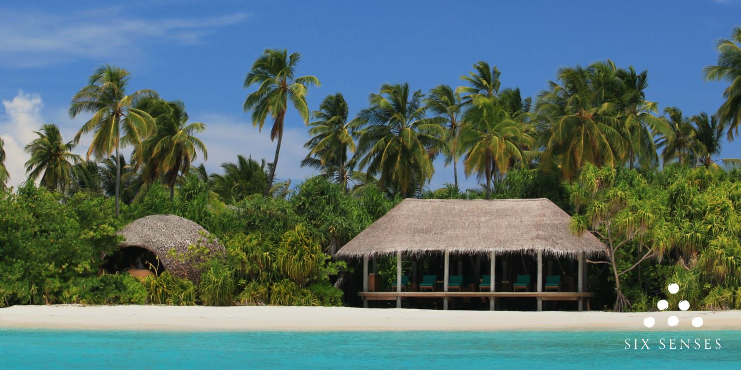 Private beachside resort hut on clear day
