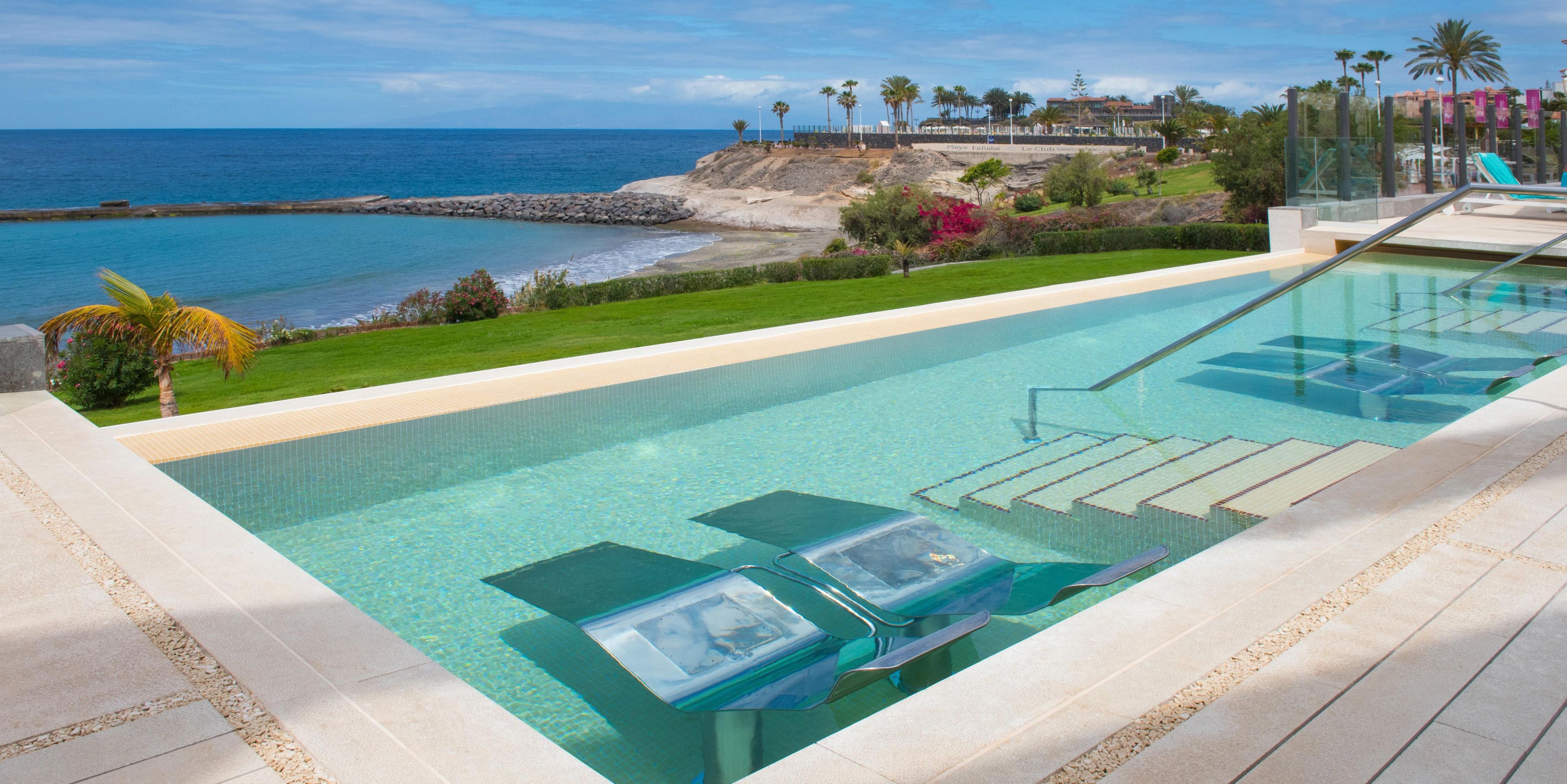 Drift into calm poolside at our adults-only Tenerife resort.