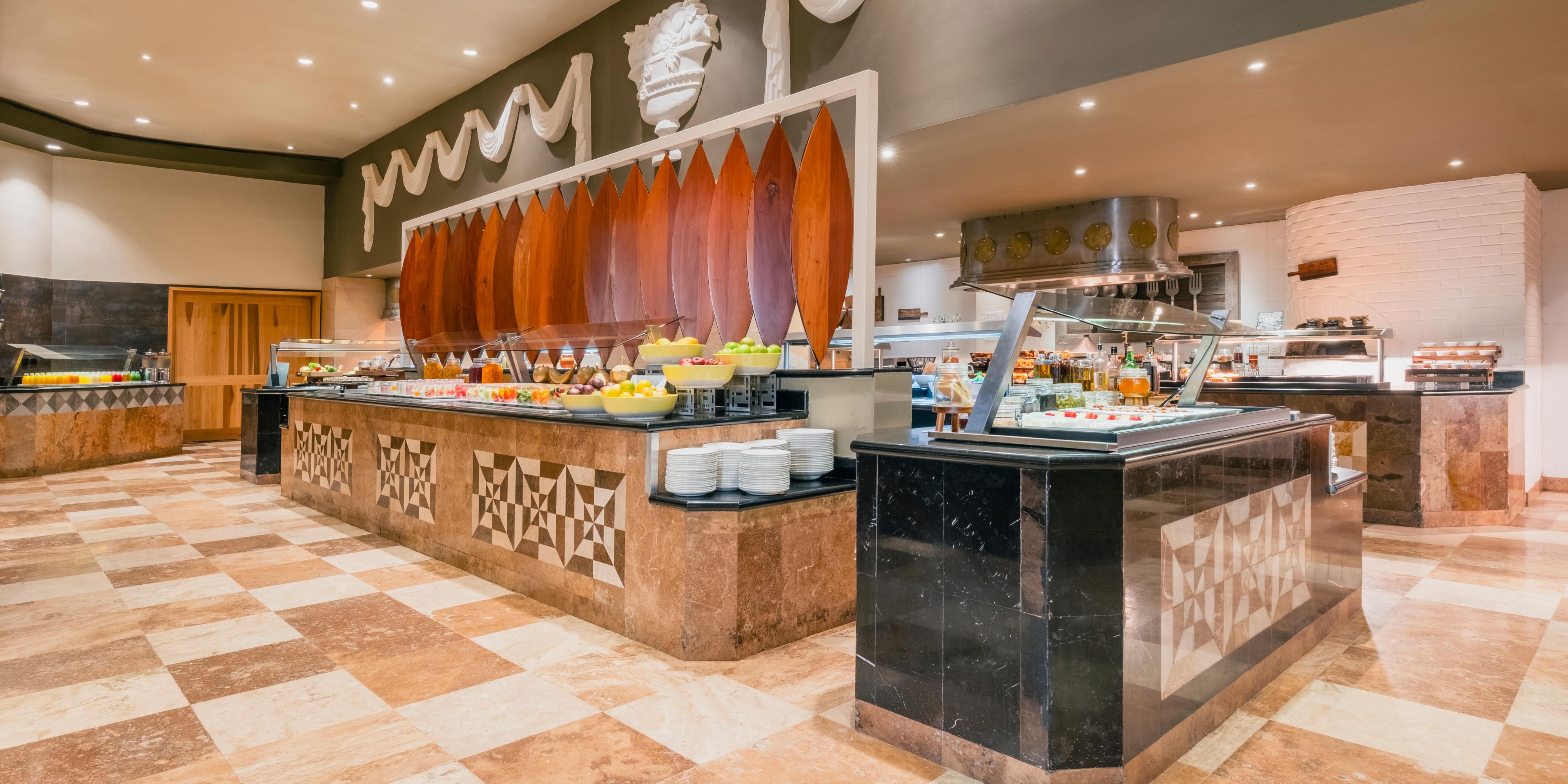 Culinary delights are a constant around here.. Enjoy round-the-clock indulgence at Star Café, offering Jamaican Blue Mountain Coffee and delectable pastries. Explore an array of flavors with access to our 10 specialty restaurants, featuring Greek, seafood, and a steakhouse, all designed to tantalize your taste buds. With 10 bars to choose from, th