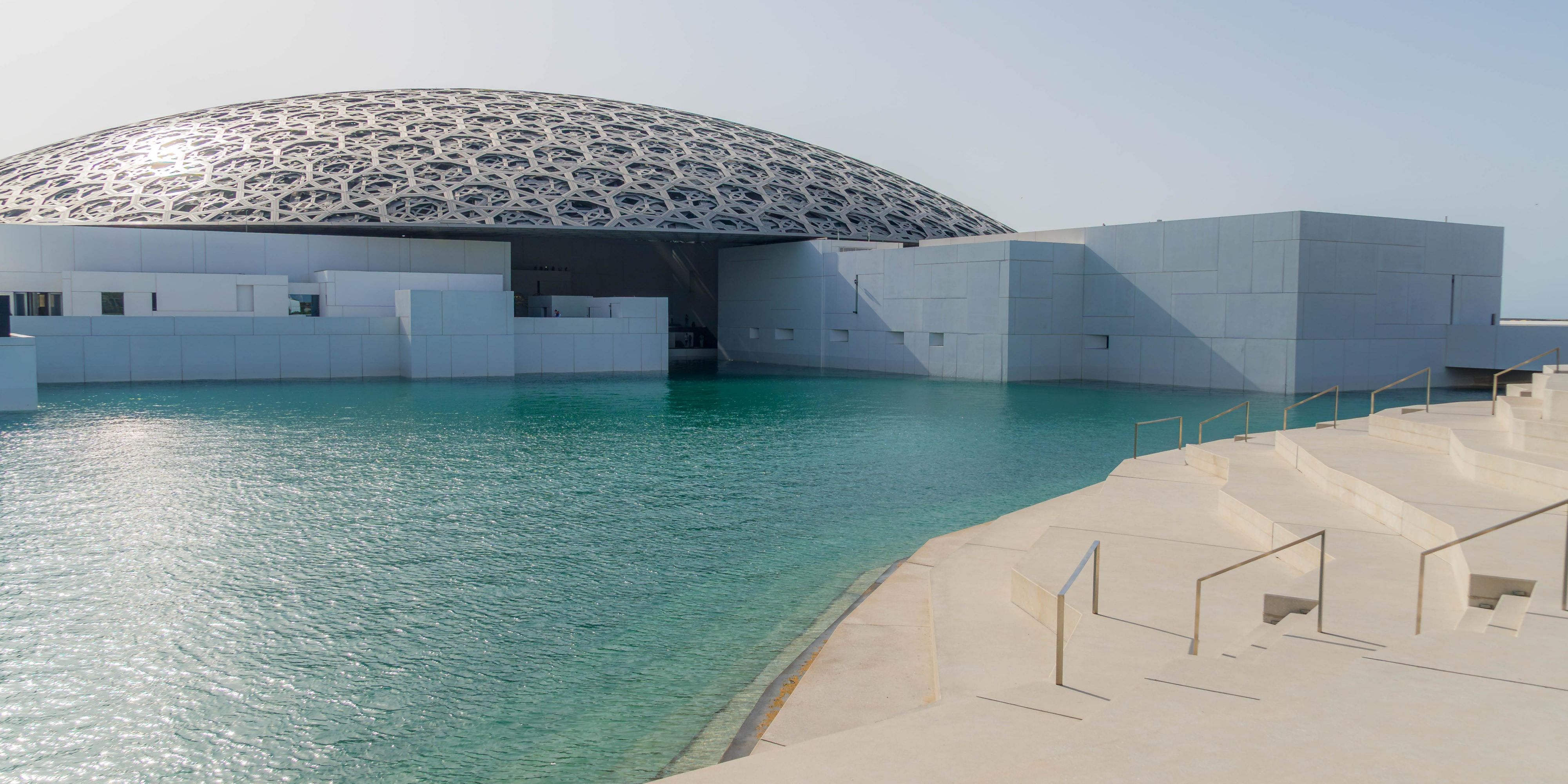 The Louvre Abu Dhabi, located 11 km away, is an architectural marvel, with its stunning domed roof casting light across the exhibits, where art and history converge. Wander through galleries that showcase humanity’s cultural legacy, bridging civilisations and time. More than a museum, it is an invitation to explore, admire, and reflect.