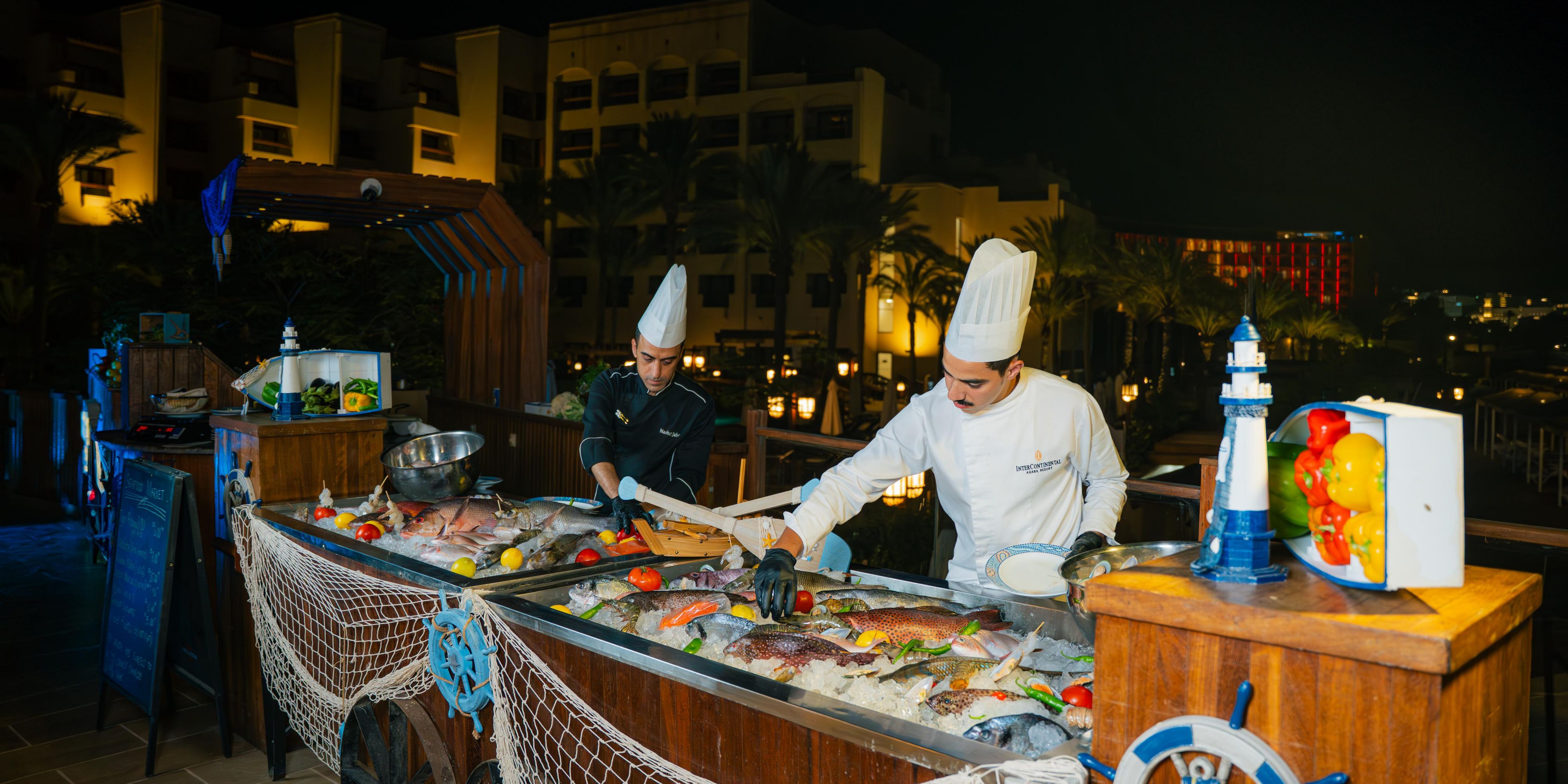 Fresh, market-style seafood served with breathtaking views of the Red Sea. Dine al fresco by the shore as your selected catch is prepared to perfection.

At The Beach Front, unwind in a relaxed open-air setting—perfect for sunset dinners and creating unforgettable moments by the sea.

Every Thursday and Friday from 7:00 pm to 11:00 pm