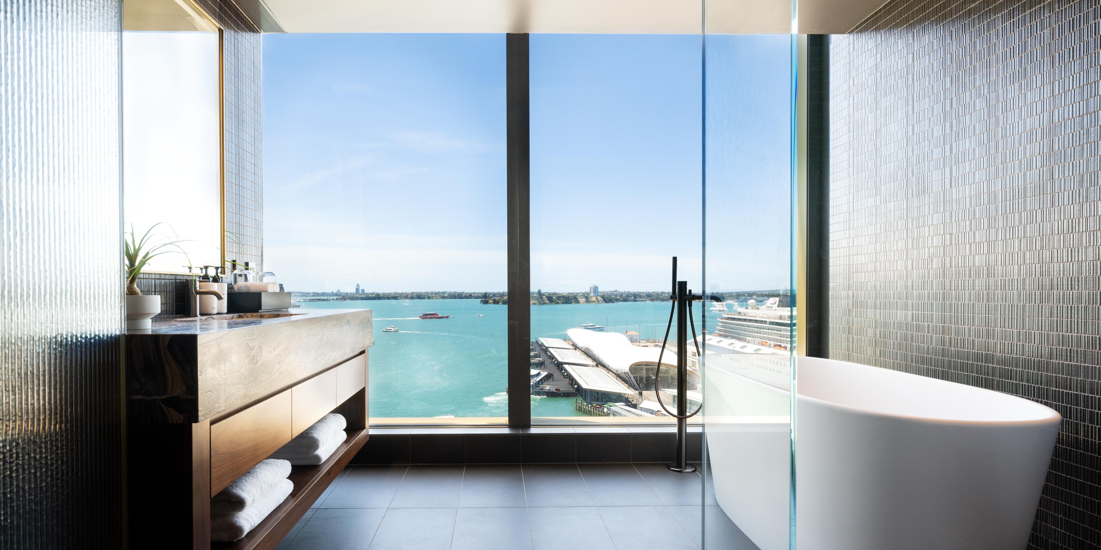 Unwind in our suites' luxurious deep soaking bathtubs with unparalleled views over Waitematā Harbour—an experience unlike any other in Auckland. Enjoy floor-to-ceiling windows, ensuite bathrooms with rain showers, and premium Byredo amenities for the ultimate indulgence.