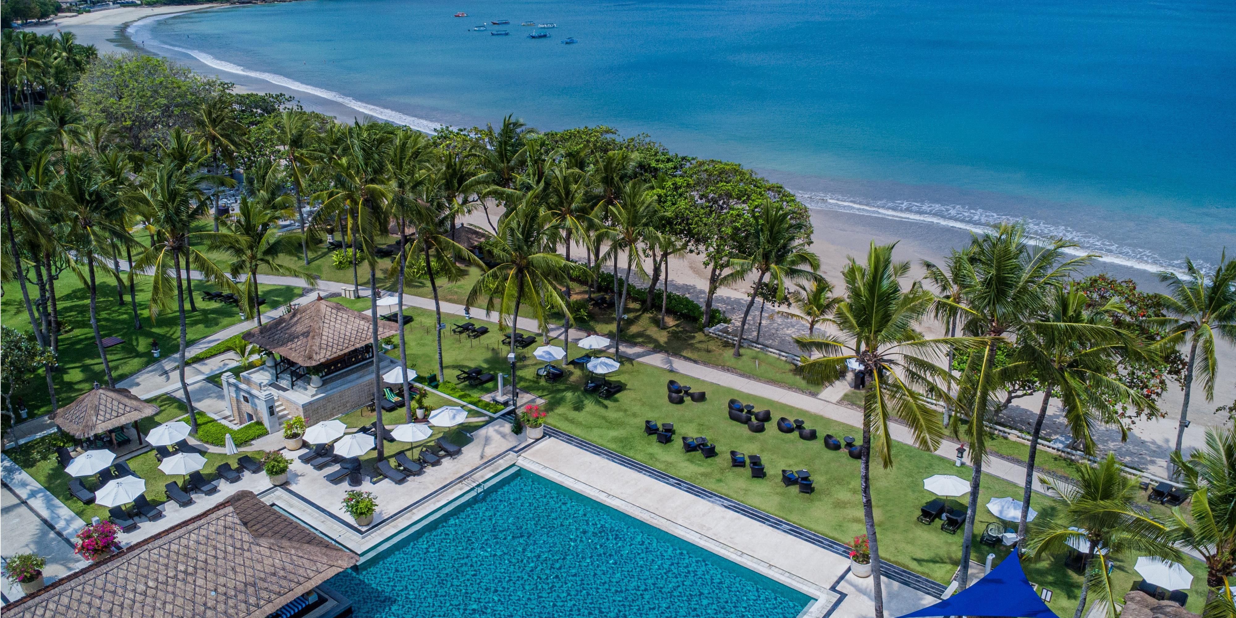 Nestled within the exclusive Jimbaran Bay on Bali’s southern coast, the resort is conveniently located near local attractions as well as the island's famous temples and destinations. It’s also only a 15-minute drive from Ngurah Rai International Airport, ensuring easy access to and from the resort.