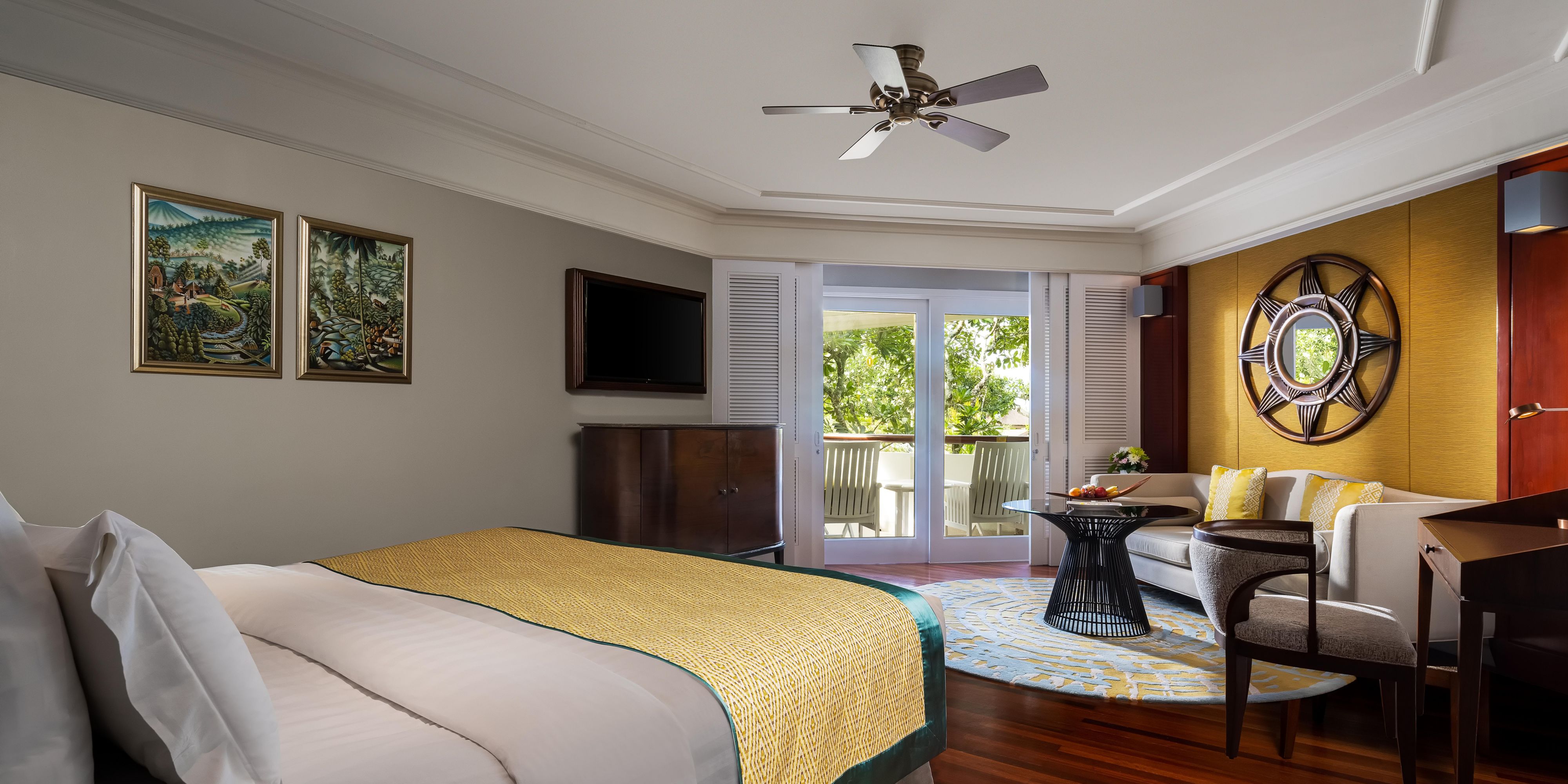 Boasts a luxurious collection of 425 beautifully appointed rooms, suites, and private villas, distributed across six distinct wings that elegantly blend modern convenience with traditional Balinese architectural elements.