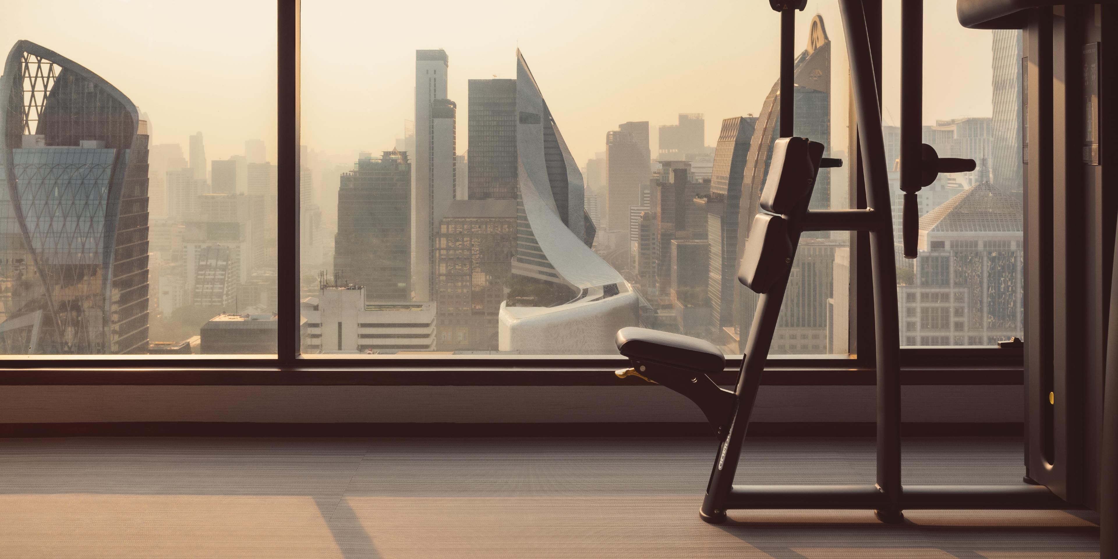 Infinity Fitness at InterContinental Bangkok offers state-of-the-art cardio machines, a boxing ring, resistance training, and a stretching zone, all with panoramic city views. Enjoy exclusive facilities like a pool, Jacuzzi, saunas, and grooming stations. Personal trainers are available for tailored workouts.