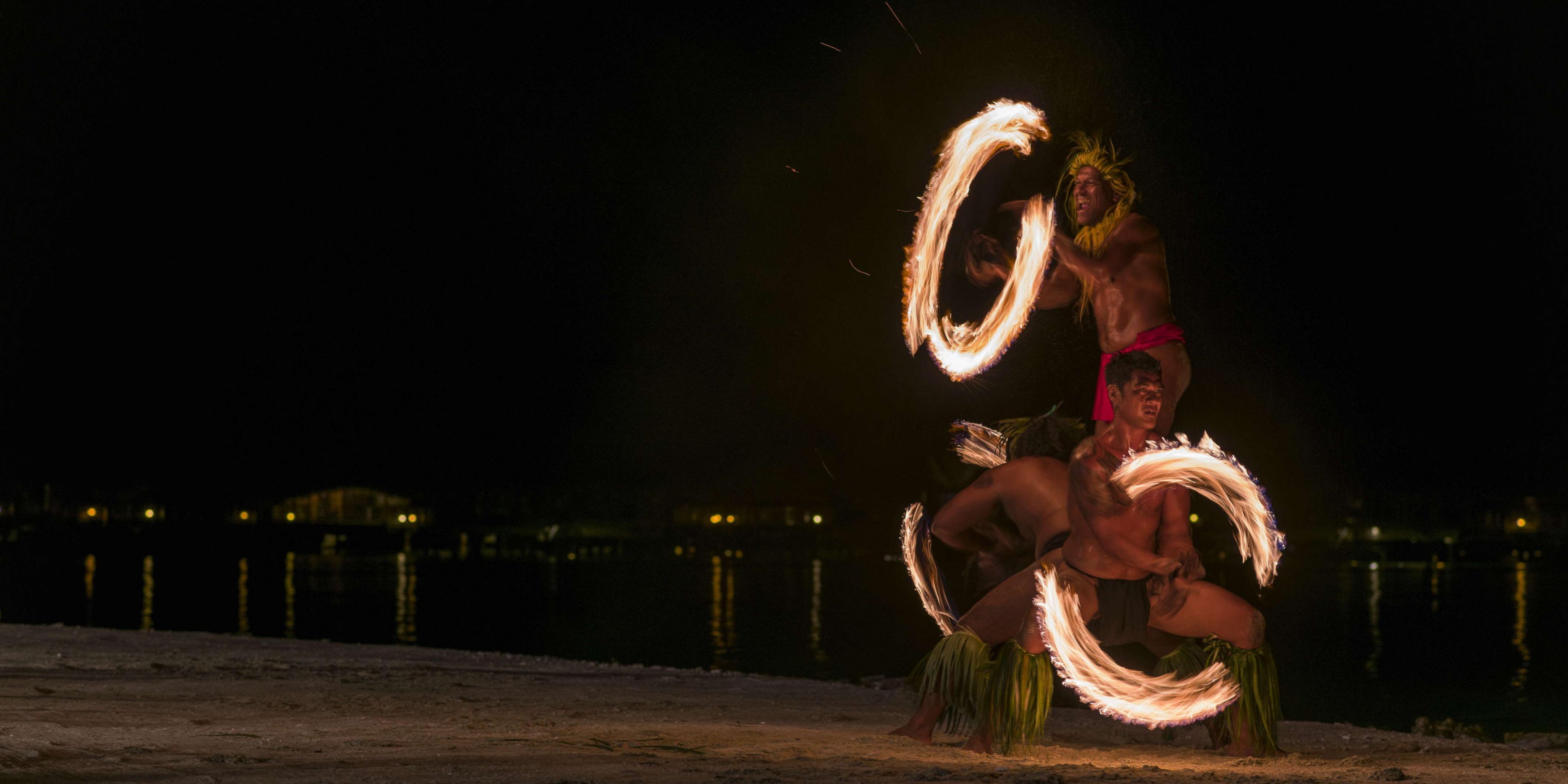 Fire dancers on the resort beach