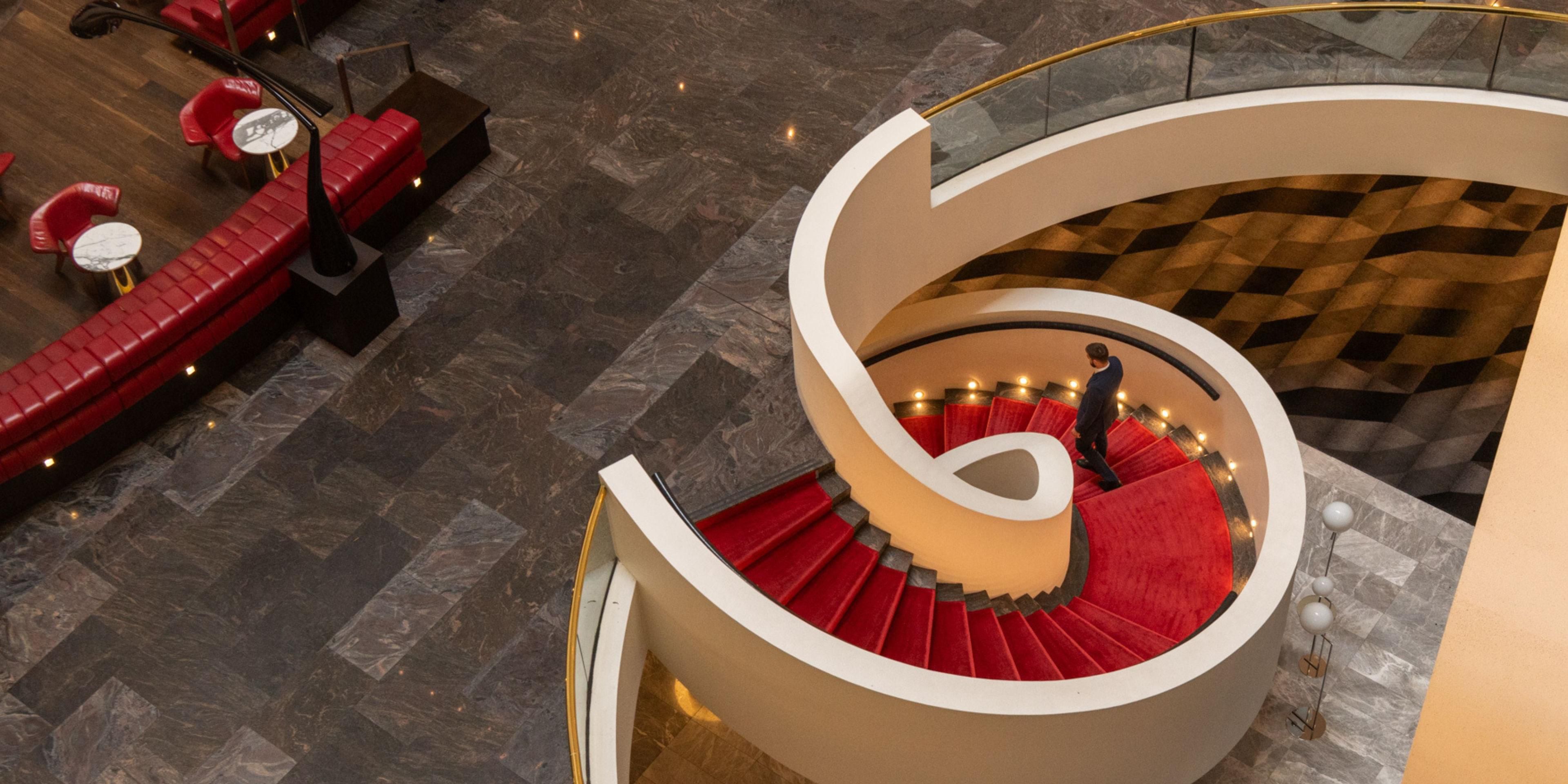 Grand staircase from lobby leading to Conference facilities