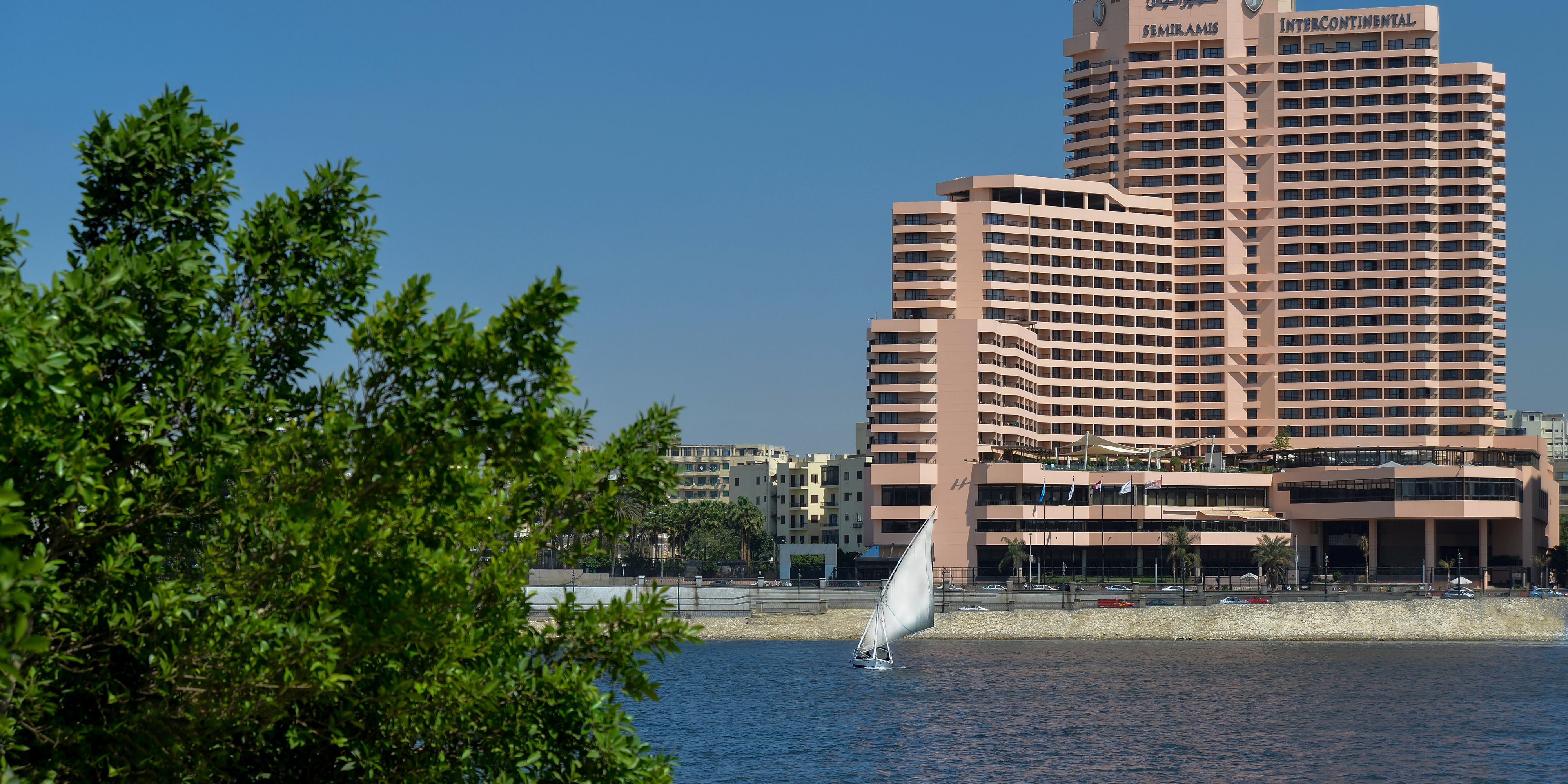 Hotel exterior overlooking the Nile by day