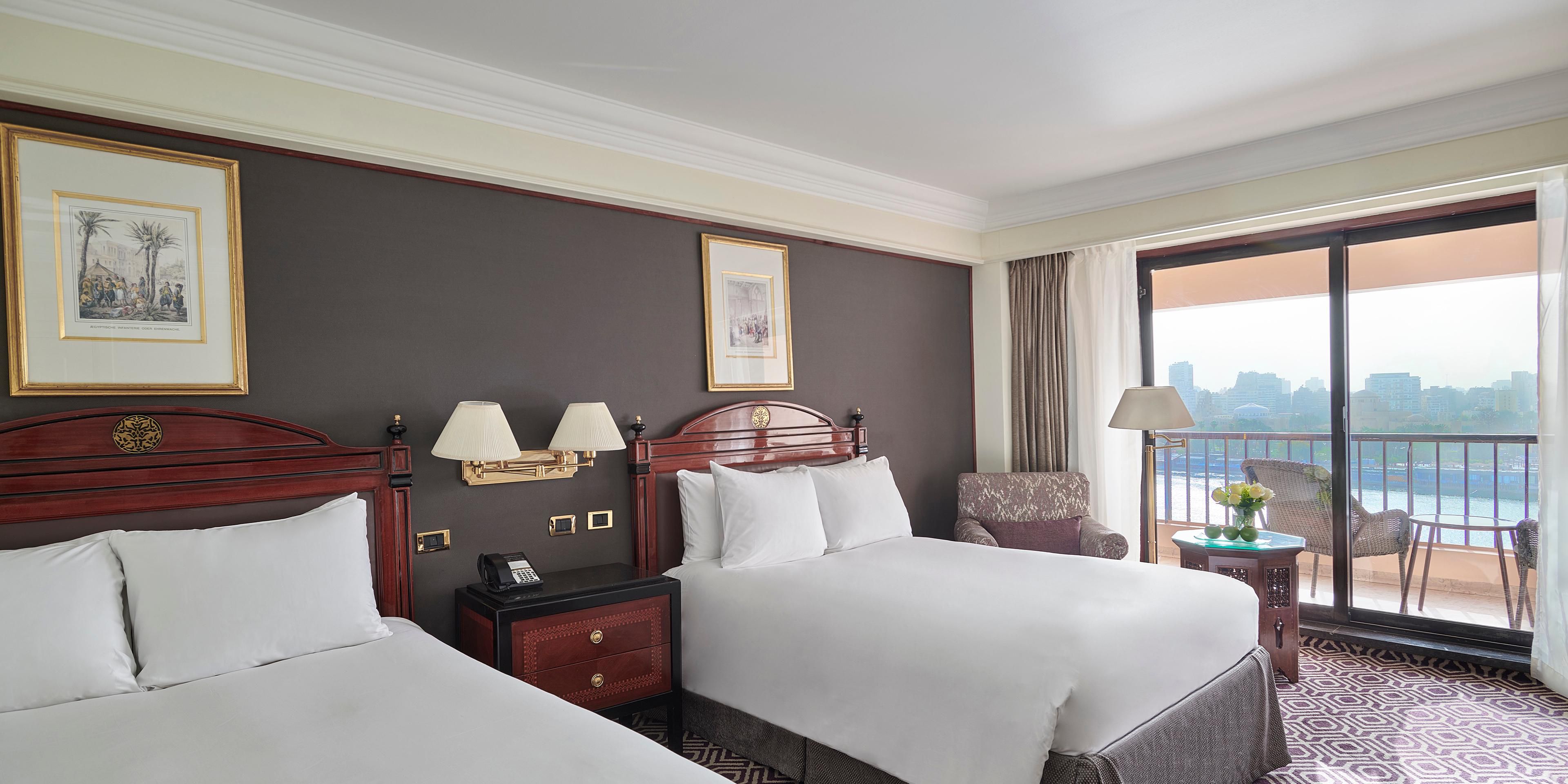 Twin beds Nile View