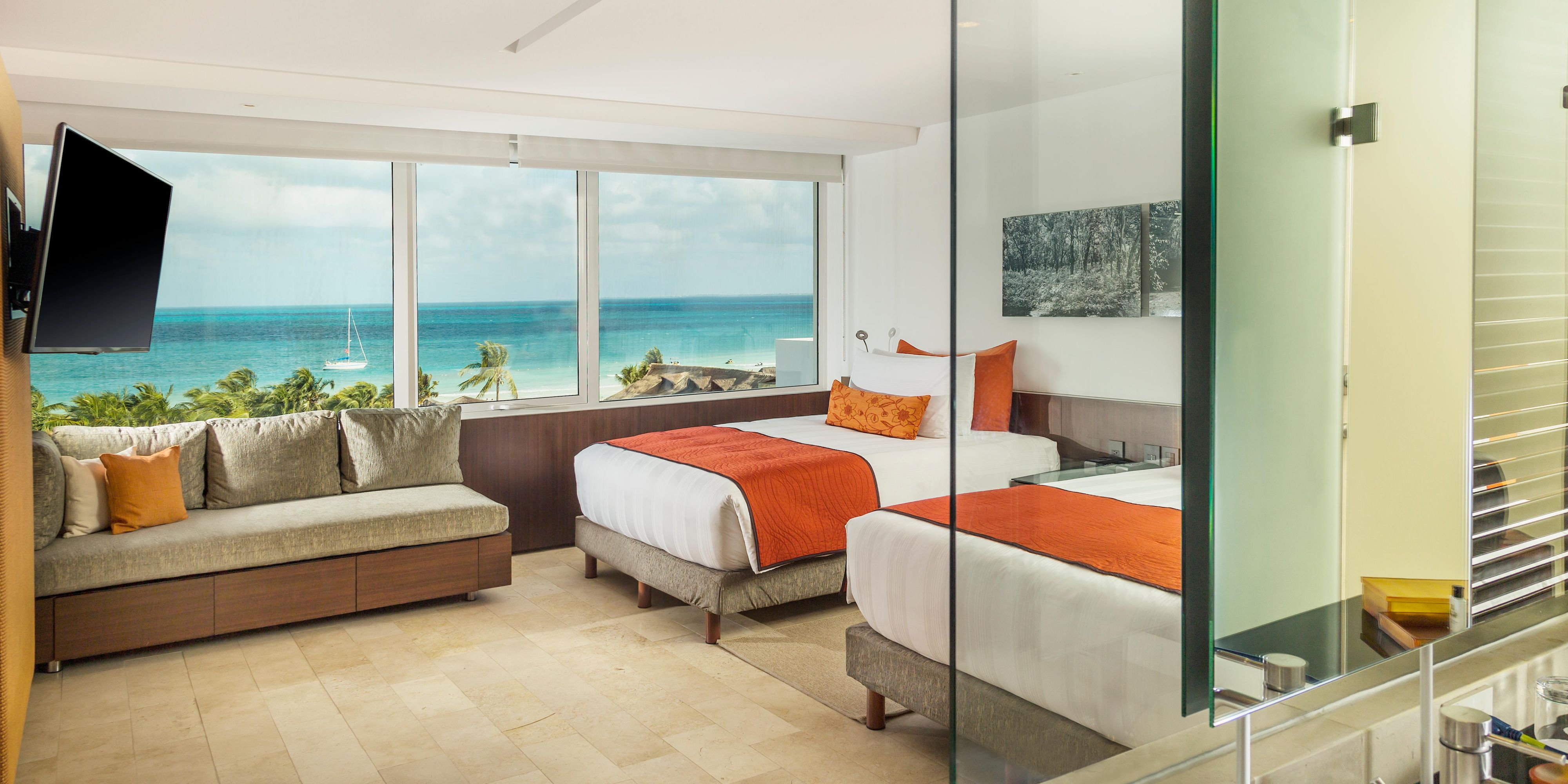 Looking for an ocean view hotel? At Presidente InterContinental Cancún, enjoy spacious rooms with private balconies overlooking the Caribbean Sea. Relax in luxury and wake up to stunning ocean views. Book your stay today.
