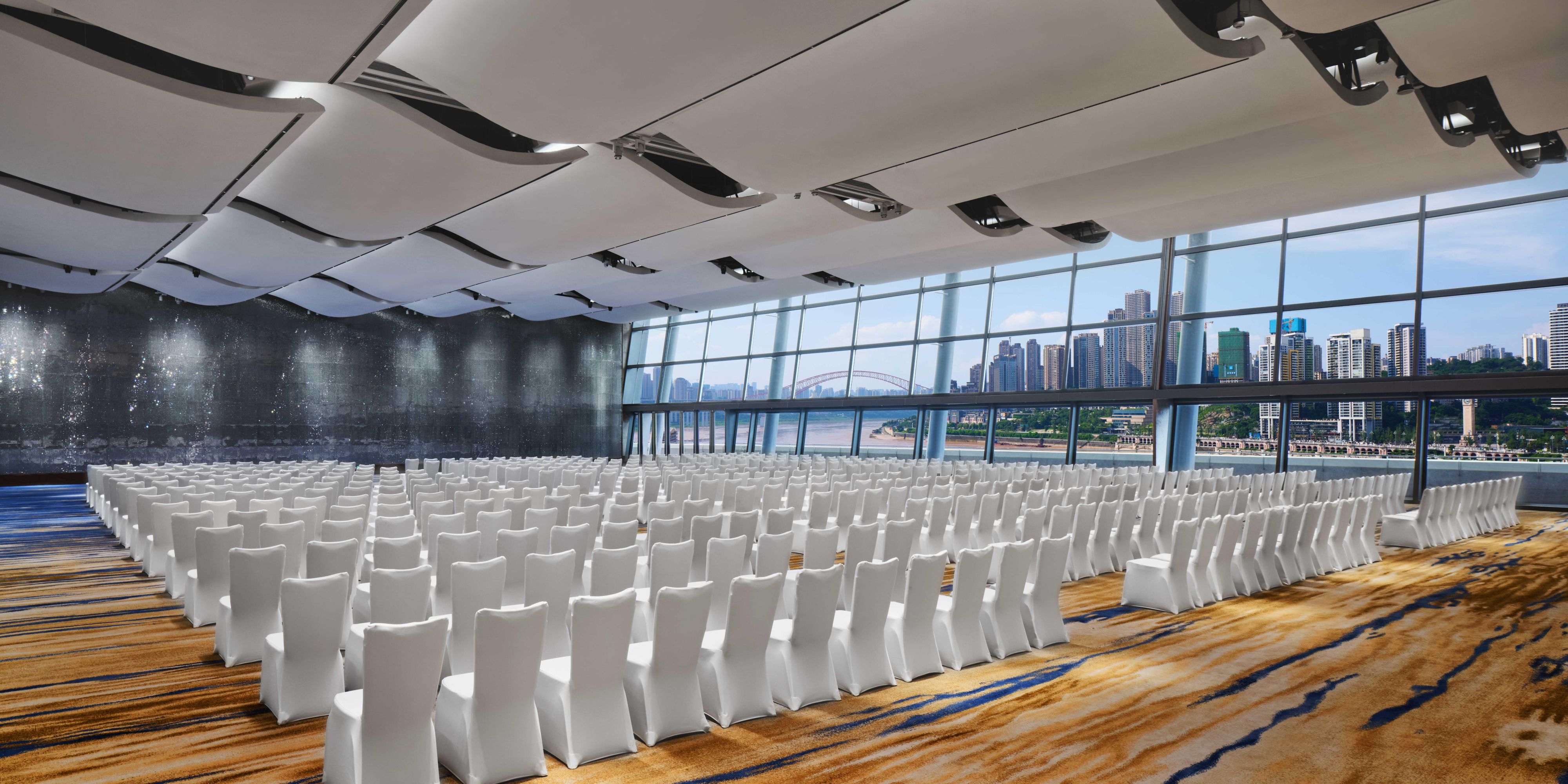 2,000sqm event spaces with 7.6m ceiling, and a full-sized window front and outdoor balcony, featuring an uninterrupted view of two rivers.