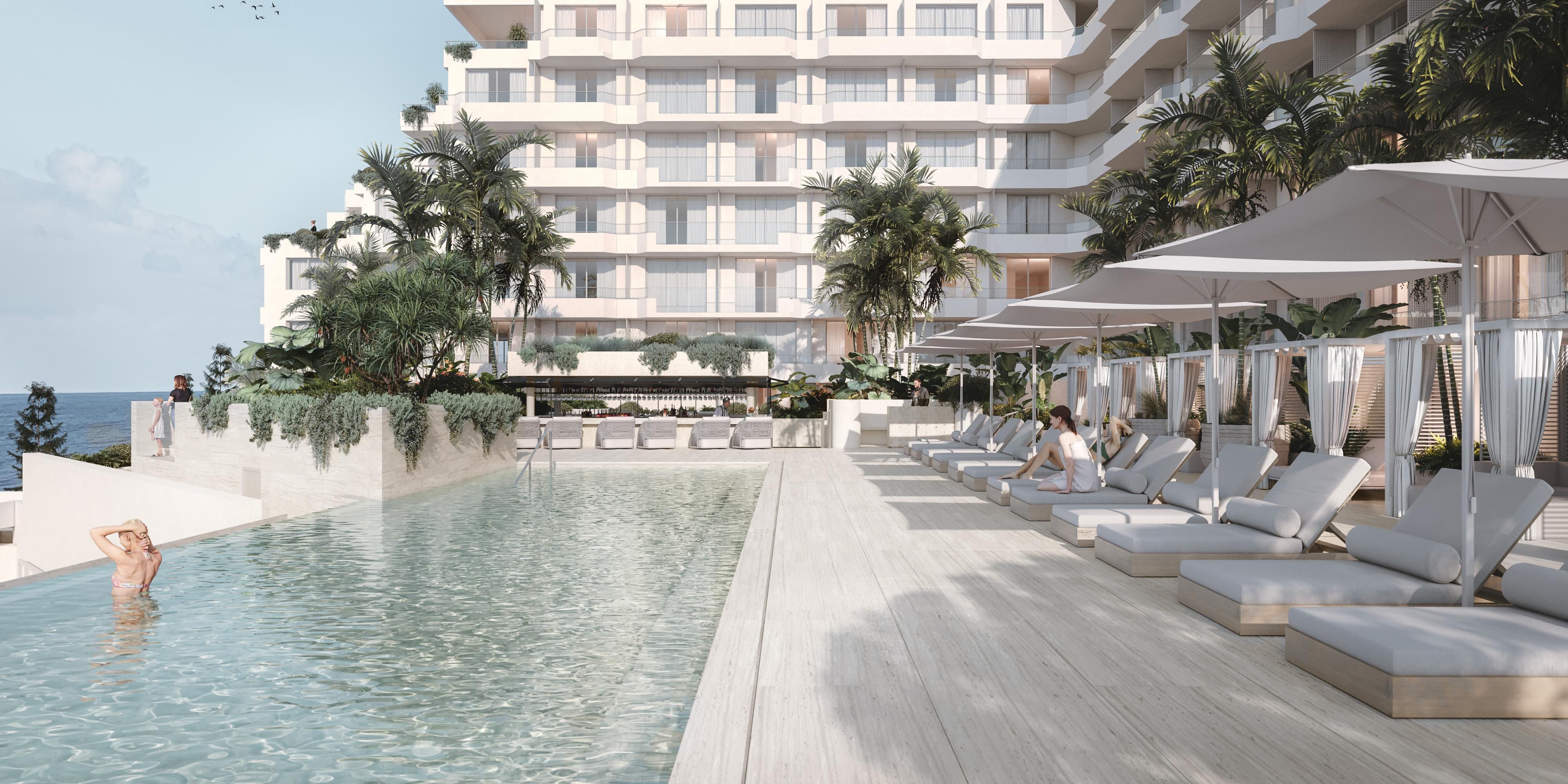 Enjoy the pool deck with views out to the ocean.