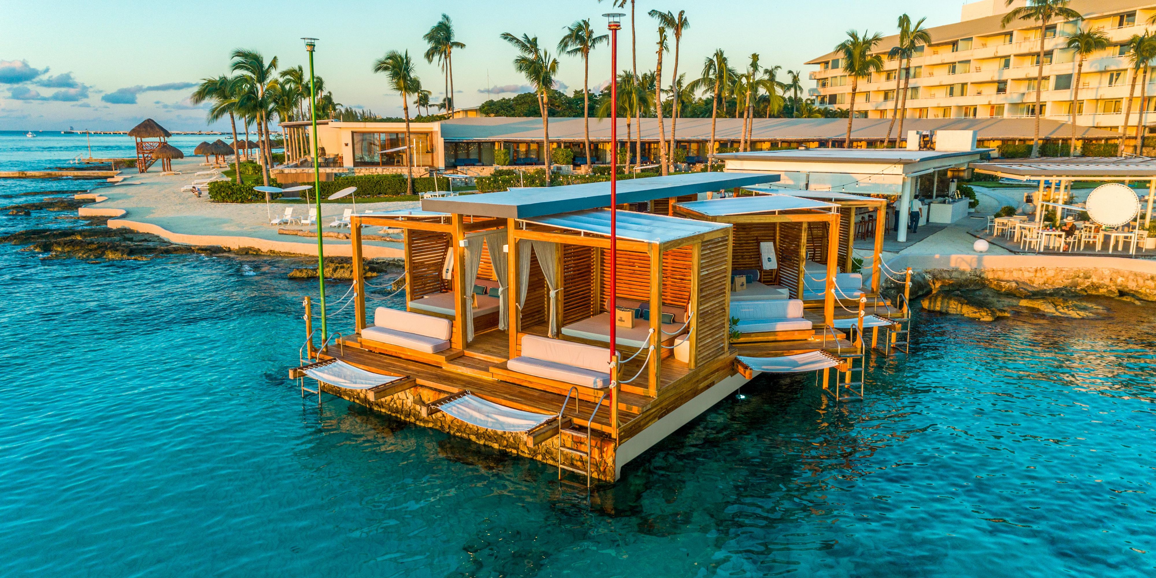 Experience luxury in our seaside cabanas with gourmet dining, attentive service, and breathtaking views. Located at Le Cap Beach Club and the main pool of Presidente InterContinental Resort & Spa Cozumel. Contact our Concierge for details: +52 987 872 9500 Ext. 6320.
