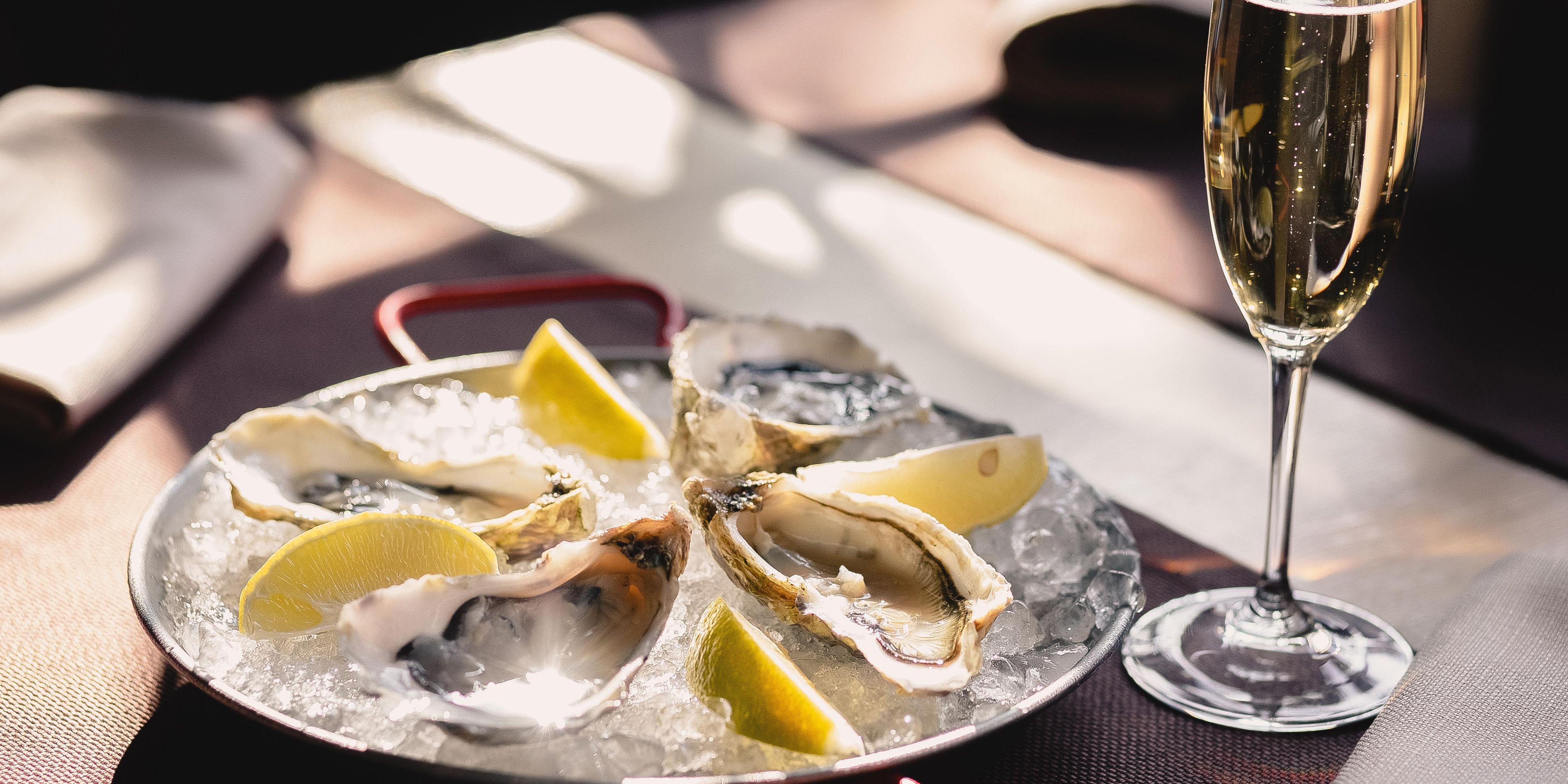 Dive into midweek fun at Bubbles + Shells every Wednesday from 5:00 to 8:00 PM at Nau Lounge. Enjoy a live-action raw bar with fresh-shucked oysters, specially priced shrimp cocktails, and ceviche, all while a live DJ sets the vibe with modern contemporary music. Sip on a refreshing glass of cava and elevate your evening with us!