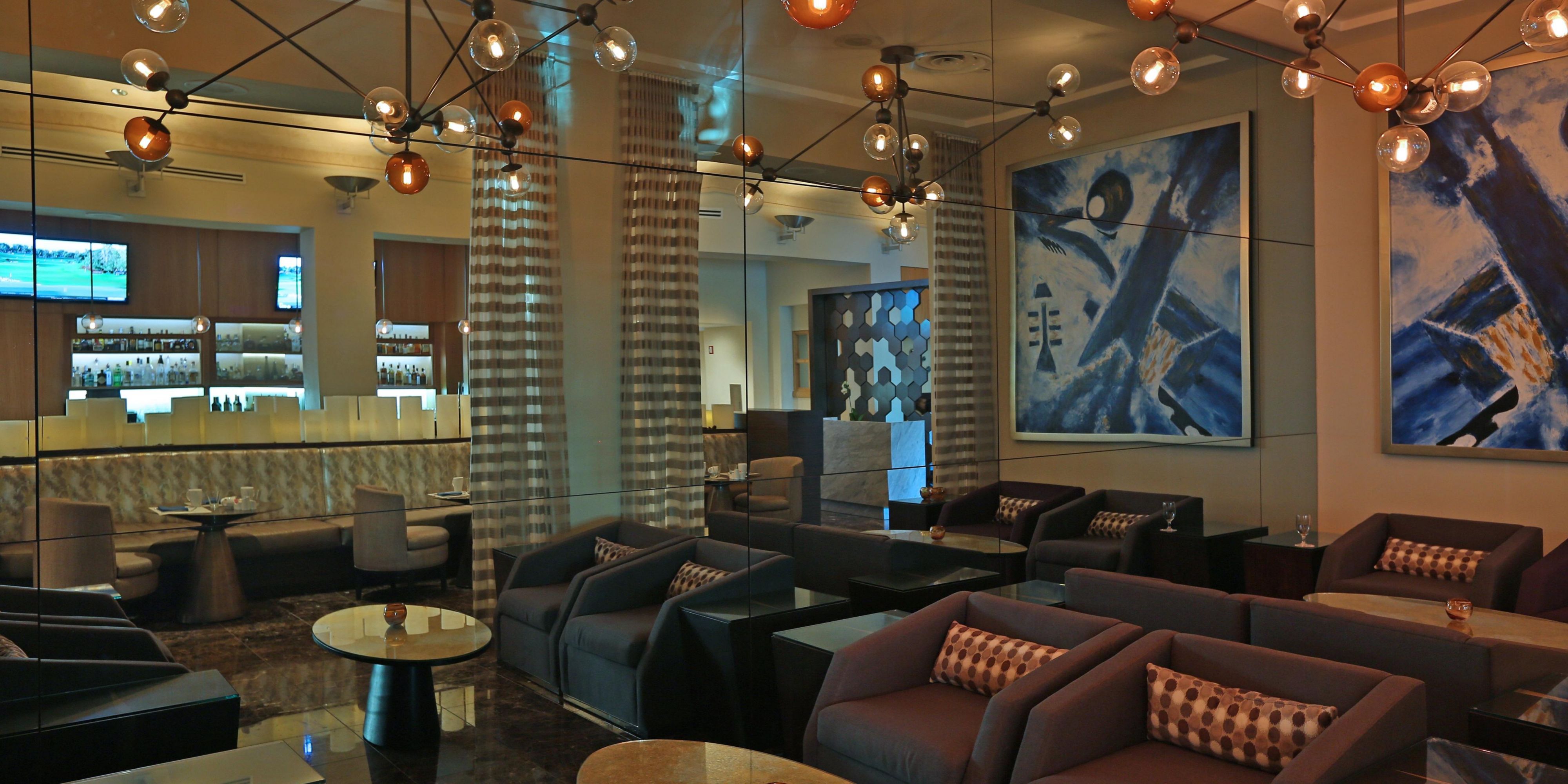Unwind over handcrafted specialty drinks and a unique selection of boutique sipping spirits at NAU Lounge, a popular happy hour spot for locals and guests alike.